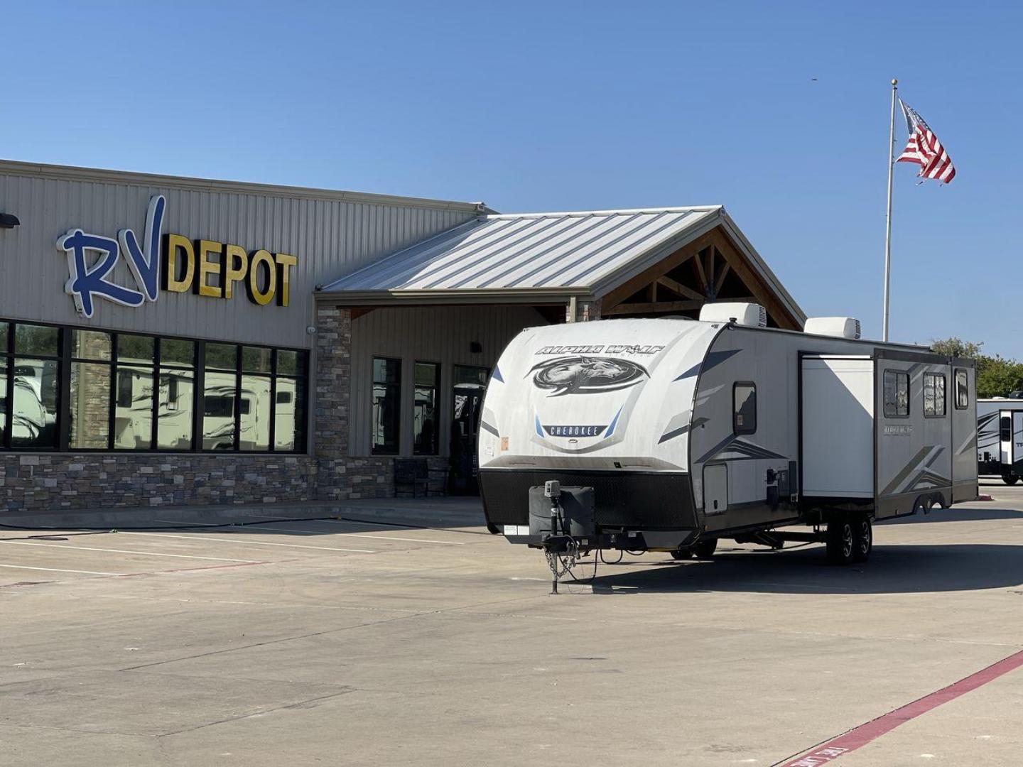 2022 FOREST RIVER CHEROKEE 33BH-L (5ZT2CKYBXN2) , Length: 37.33 ft. | Dry Weight: 7,986 lbs. | Gross Weight: 9,863 lbs. | Slides: 2 transmission, located at 4319 N Main St, Cleburne, TX, 76033, (817) 678-5133, 32.385960, -97.391212 - The 2022 Forest River Cherokee Alpha Wolf 33BH-L showcases a modern and sleek exterior which is perfectly built for extended road adventures. Measuring 37.33 feet in length, it features a two-tone gray and black color scheme with sharp, angular graphics that give it a contemporary, aggressive look. - Photo#0