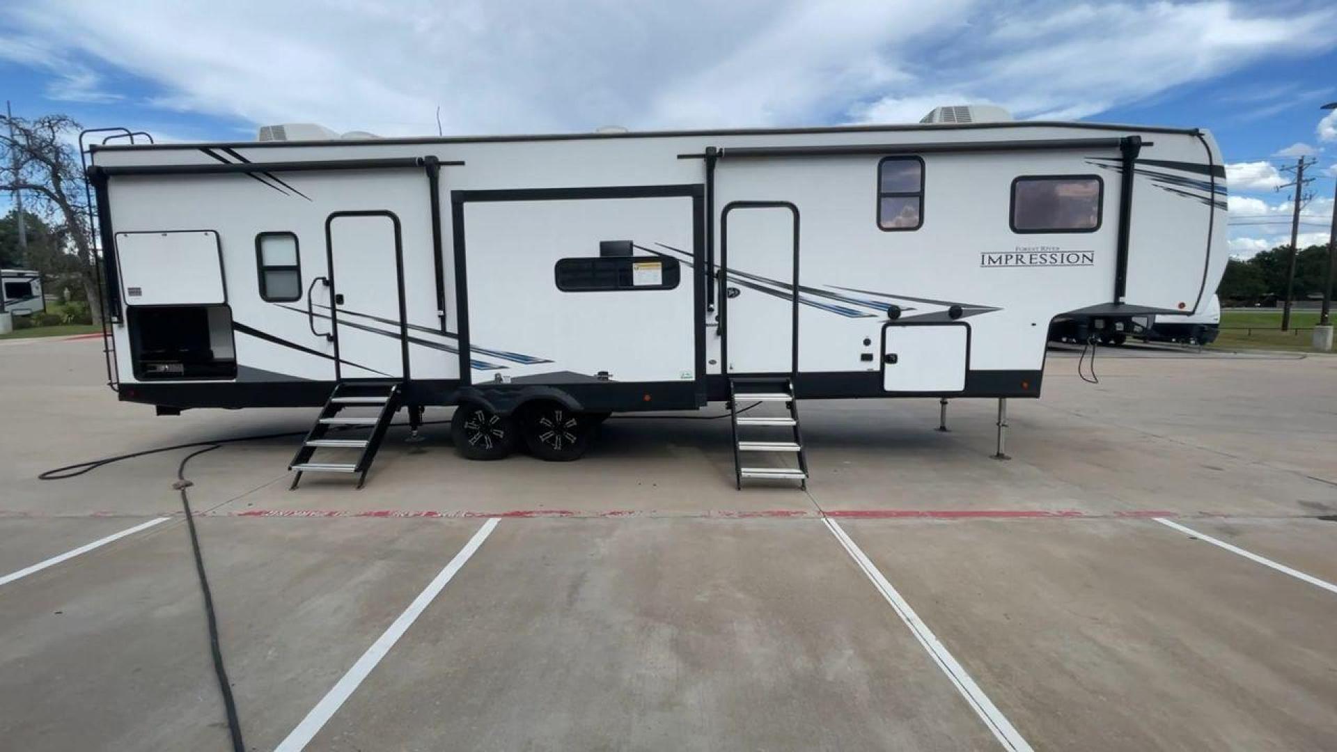 2022 FOREST RIVER IMPRESSION 330BH (5ZT3MPYB4ND) , Length: 41 ft. | Dry Weight: 10,433 lbs. | Gross Weight: 14,165 lbs. | Slides: 3 transmission, located at 4319 N Main St, Cleburne, TX, 76033, (817) 678-5133, 32.385960, -97.391212 - The 2022 Forest River Impression 330BH is a luxurious 41-foot fifth wheel. It is designed for ultimate comfort and convenience on the road. With a dry weight of 10,433 lbs and a gross weight of 14,165 lbs, it offers a spacious and functional layout perfect for long trips or family adventures. Its sl - Photo#2