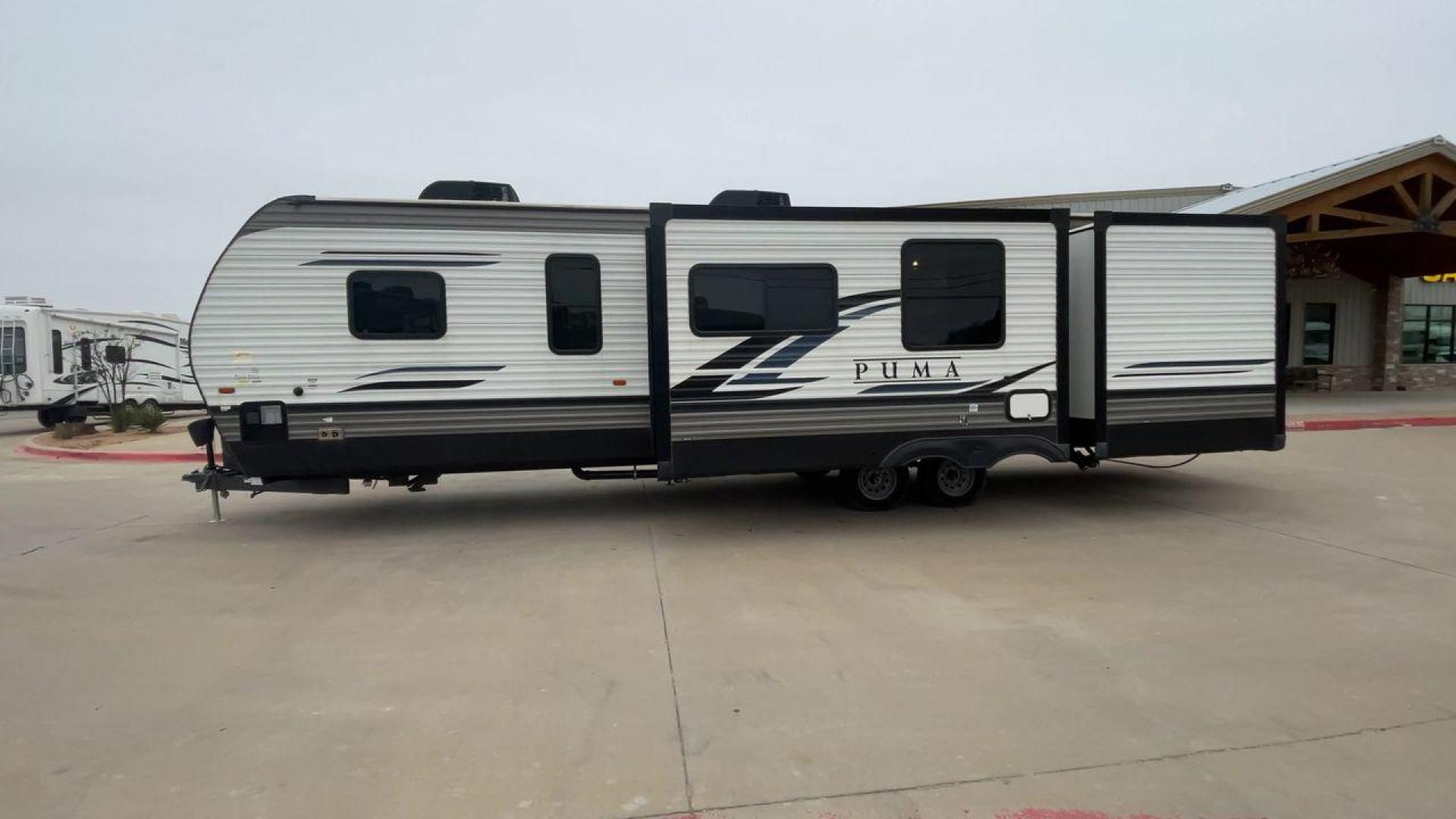 2022 FOREST RIVER PUMA 32BH2B (4X4TPUH25NP) , Length: 38.5 ft. | Dry Weight: 9,023 lbs. | Gross Weight: 11,230 lbs. | Slides: 3 transmission, located at 4319 N Main St, Cleburne, TX, 76033, (817) 678-5133, 32.385960, -97.391212 - Photo#6