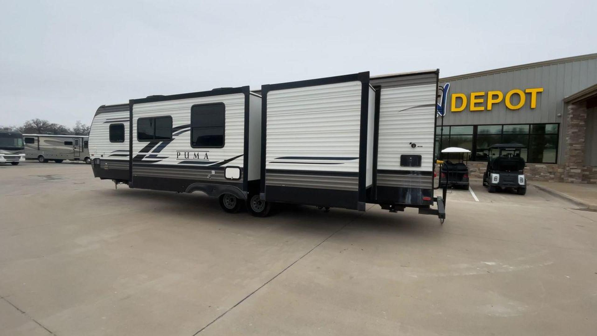 2022 FOREST RIVER PUMA 32BH2B (4X4TPUH25NP) , Length: 38.5 ft. | Dry Weight: 9,023 lbs. | Gross Weight: 11,230 lbs. | Slides: 3 transmission, located at 4319 N Main St, Cleburne, TX, 76033, (817) 678-5133, 32.385960, -97.391212 - Photo#7