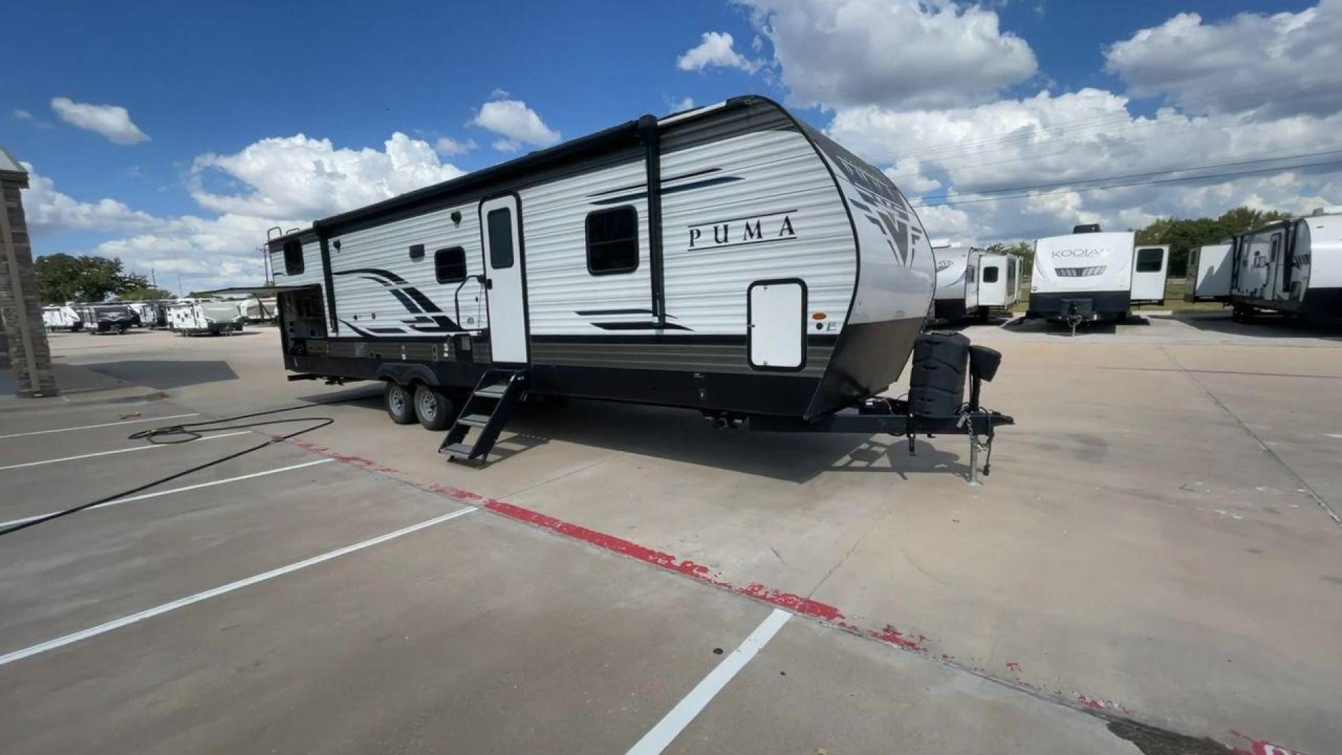 2022 FOREST RIVER PUMA 32RBFQ (4X4TPUH28NP) , Length: 36.92 ft. | Dry Weight: 8,998 lbs. | Gross Weight: 10,500 lbs. | Slides: 3 transmission, located at 4319 N Main St, Cleburne, TX, 76033, (817) 678-5133, 32.385960, -97.391212 - Photo#3