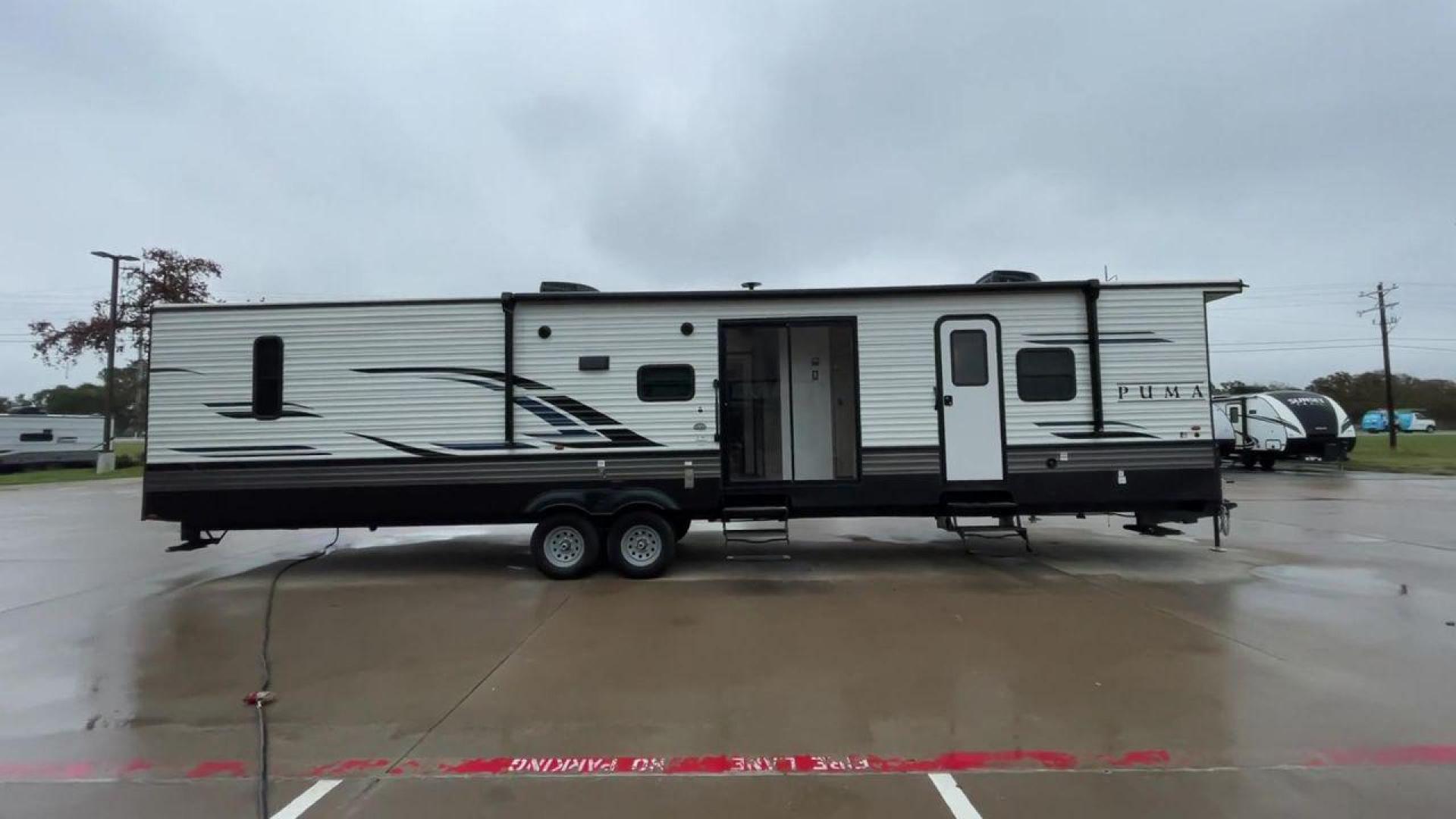 2022 FOREST RIVER PUMA TOWABLES (4X4TPUR22PP) , Length: 42.33 ft. | Dry Weight: 10,162 lbs. | Gross Weight: 12,000 lbs.| Slides: 3 transmission, located at 4319 N Main St, Cleburne, TX, 76033, (817) 678-5133, 32.385960, -97.391212 - If you're in the market for a top-of-the-line travel trailer bunk house, look no further than this 2022 PUMA 39DBT available at RV Depot in Cleburne, TX. With its exceptional features and unbeatable price of $60,995, this vehicle is a steal for any outdoor enthusiast. The 2022 PUMA 39DBT is desig - Photo#2