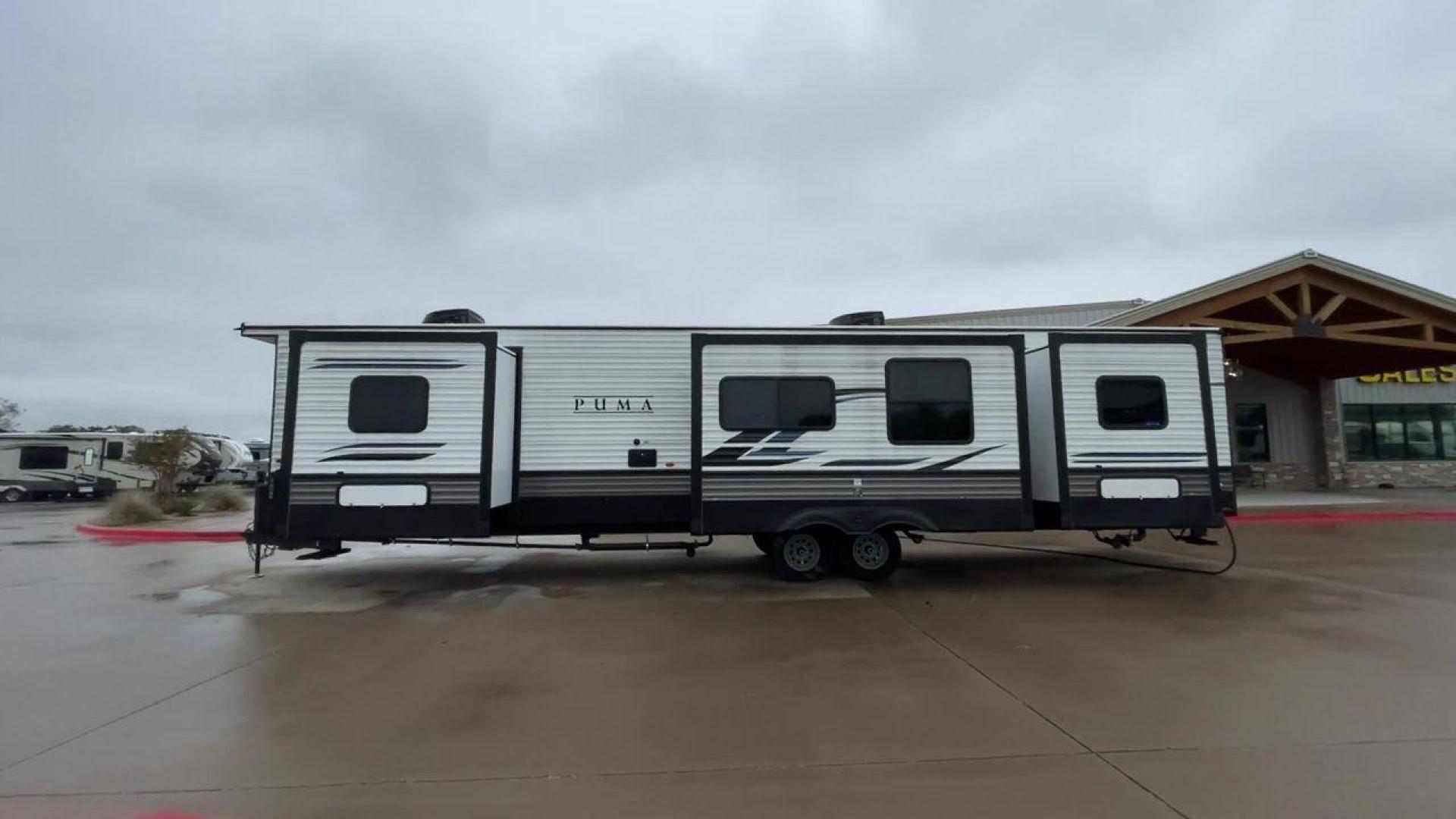 2022 FOREST RIVER PUMA TOWABLES (4X4TPUR22PP) , Length: 42.33 ft. | Dry Weight: 10,162 lbs. | Gross Weight: 12,000 lbs.| Slides: 3 transmission, located at 4319 N Main St, Cleburne, TX, 76033, (817) 678-5133, 32.385960, -97.391212 - If you're in the market for a top-of-the-line travel trailer bunk house, look no further than this 2022 PUMA 39DBT available at RV Depot in Cleburne, TX. With its exceptional features and unbeatable price of $60,995, this vehicle is a steal for any outdoor enthusiast. The 2022 PUMA 39DBT is desig - Photo#6