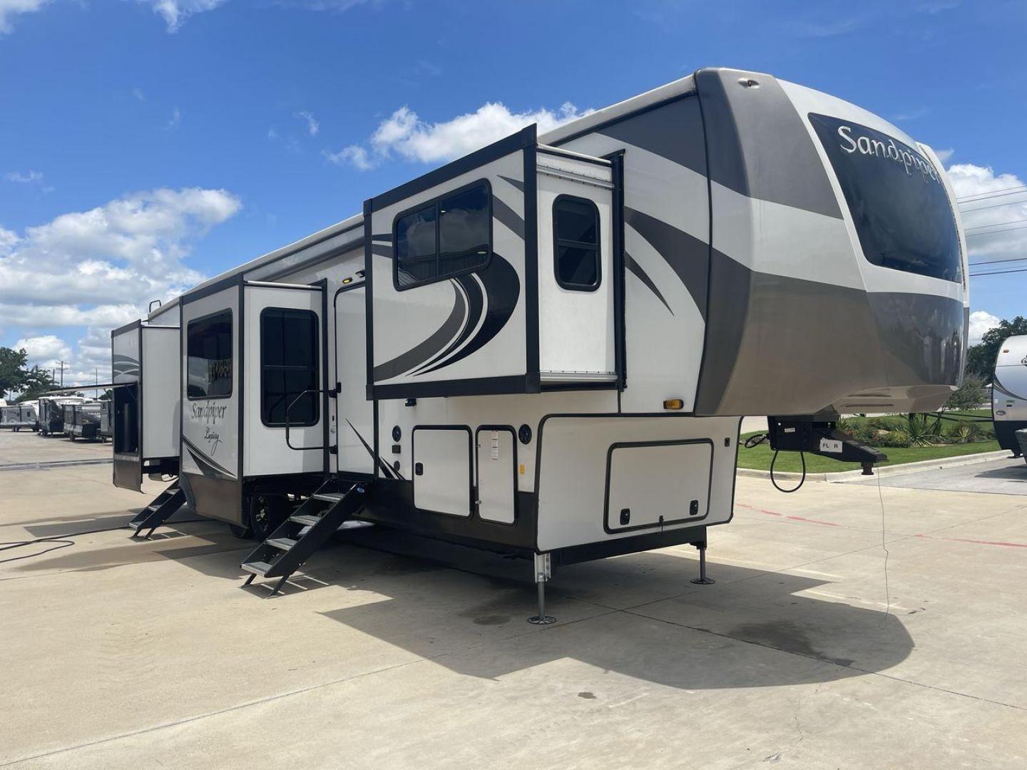 2022 FOREST RIVER SANDPIPER 379FLOK (4X4FSAP21NJ) , Length: 42.75 ft. | Dry Weight: 13,069 lbs. | Gross Weight: 16,069 lbs. | Slides: 6 transmission, located at 4319 N Main St, Cleburne, TX, 76033, (817) 678-5133, 32.385960, -97.391212 - The 2022 Forest River Sandpiper 379FLOK is a luxury fifth wheel designed to provide top-tier comfort and spacious living for extended stays or full-time RVers. At a length of 42.75 feet, this model offers a grand interior space that includes six slide-outs, ensuring an expansive layout that feels li - Photo#22