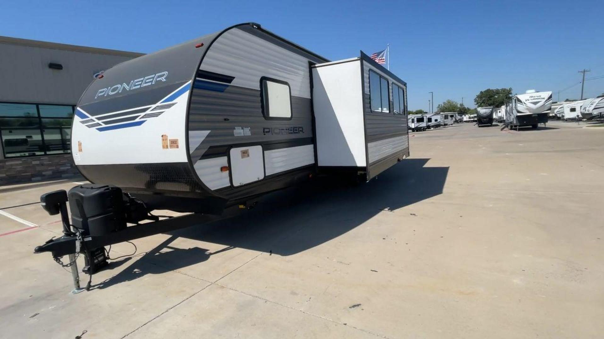 2022 HEARTLAND PIONEER QB300 (5SFPB3521NE) , Length: 35 ft. | Dry Weight: 6,896 lbs. | Gross Weight: 9,000 lbs. | Slides: 1 transmission, located at 4319 N Main St, Cleburne, TX, 76033, (817) 678-5133, 32.385960, -97.391212 - The 2022 Heartland Pioneer QB300 is a spacious and well-equipped travel trailer, perfect for family adventures. With a length of 35 feet, this model provides ample living space while maintaining a dry weight of 6,896 lbs. and a gross weight of 9,000 lbs. It includes 1 slide-out, optimizing interior - Photo#5