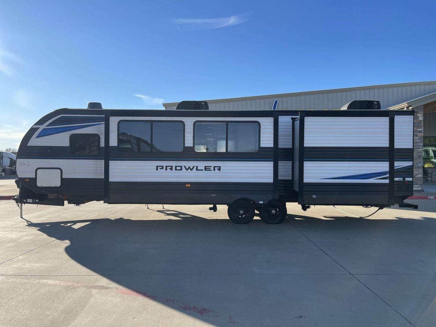 2022 HEARTLAND PROWLER 320BH (5SFPB3722NE) , Length: 36.7 ft. | Dry Weight: 7,980 lbs. | Gross Weight: 9,600 lbs. | Slides: 2 transmission, located at 4319 N Main St, Cleburne, TX, 76033, (817) 678-5133, 32.385960, -97.391212 - The 2022 Heartland Prowler 320BH is a spacious and family-oriented travel trailer, thoughtfully designed to provide comfort and convenience for your adventures. Measuring 36.7 ft. in length, 8.04 ft. in width, and 11.33 ft. in height, it offers plenty of room to accommodate large groups. With a dry - Photo#24