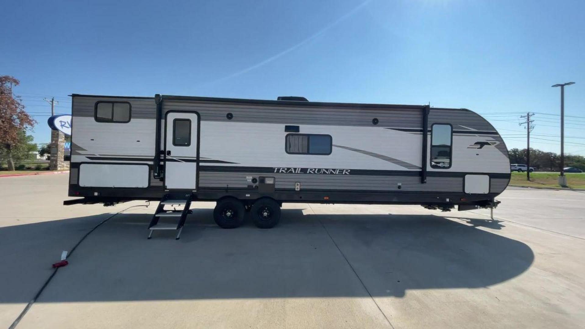 2022 HEARTLAND TRAIL RUNNER 31DB (5SFEB3728NE) , Length: 36.92 ft. | Dry Weight: 7,040 lbs. | Gross Weight: 9,642 lbs. | Slides: 1 transmission, located at 4319 N Main St, Cleburne, TX, 76033, (817) 678-5133, 32.385960, -97.391212 - The 2022 Heartland Trail Runner 31DB is a flexible, family-friendly travel trailer that will make your camping trip more enjoyable. With a length of 36.92 feet and a dry weight of 7,040 pounds, this trailer gives you plenty of room and comfort for your trips. The gross weight of 9,642 pounds means t - Photo#2