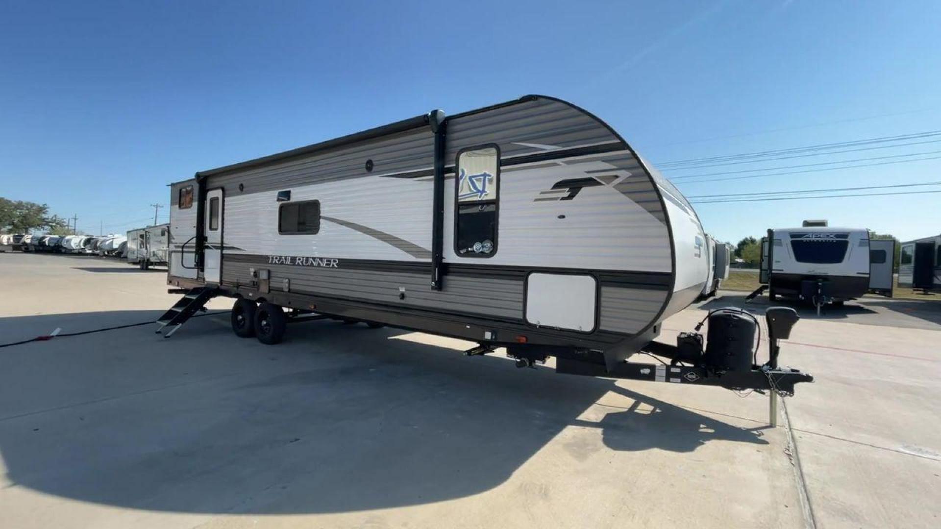 2022 HEARTLAND TRAIL RUNNER 31DB (5SFEB3728NE) , Length: 36.92 ft. | Dry Weight: 7,040 lbs. | Gross Weight: 9,642 lbs. | Slides: 1 transmission, located at 4319 N Main St, Cleburne, TX, 76033, (817) 678-5133, 32.385960, -97.391212 - The 2022 Heartland Trail Runner 31DB is a flexible, family-friendly travel trailer that will make your camping trip more enjoyable. With a length of 36.92 feet and a dry weight of 7,040 pounds, this trailer gives you plenty of room and comfort for your trips. The gross weight of 9,642 pounds means t - Photo#3