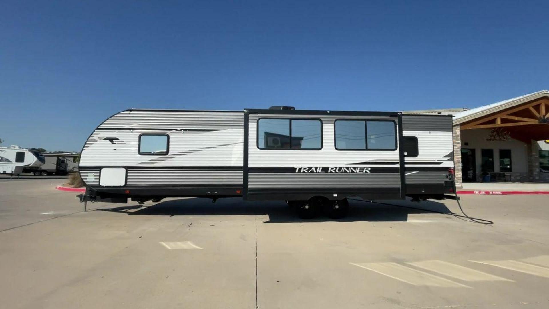 2022 HEARTLAND TRAIL RUNNER 31DB (5SFEB3728NE) , Length: 36.92 ft. | Dry Weight: 7,040 lbs. | Gross Weight: 9,642 lbs. | Slides: 1 transmission, located at 4319 N Main St, Cleburne, TX, 76033, (817) 678-5133, 32.385960, -97.391212 - The 2022 Heartland Trail Runner 31DB is a flexible, family-friendly travel trailer that will make your camping trip more enjoyable. With a length of 36.92 feet and a dry weight of 7,040 pounds, this trailer gives you plenty of room and comfort for your trips. The gross weight of 9,642 pounds means t - Photo#6