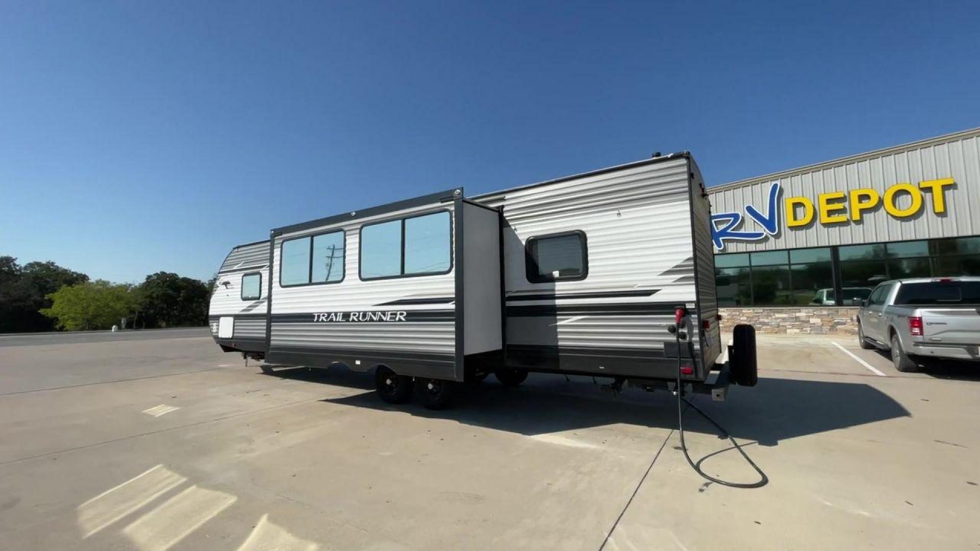 2022 HEARTLAND TRAIL RUNNER 31DB (5SFEB3728NE) , Length: 36.92 ft. | Dry Weight: 7,040 lbs. | Gross Weight: 9,642 lbs. | Slides: 1 transmission, located at 4319 N Main St, Cleburne, TX, 76033, (817) 678-5133, 32.385960, -97.391212 - The 2022 Heartland Trail Runner 31DB is a flexible, family-friendly travel trailer that will make your camping trip more enjoyable. With a length of 36.92 feet and a dry weight of 7,040 pounds, this trailer gives you plenty of room and comfort for your trips. The gross weight of 9,642 pounds means t - Photo#7