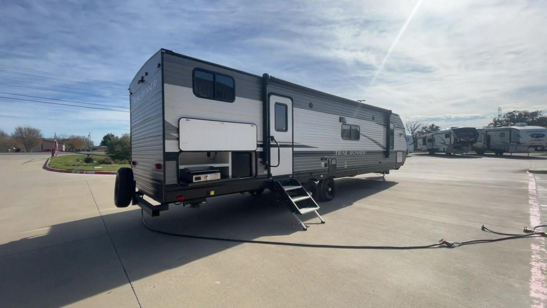 2022 HEARTLAND TRAIL RUNNER 31DB (5SFEB3721NE) , Length: 36.92 ft. | Dry Weight: 7,040 lbs. | Gross Weight: 9,642 lbs. | Slides: 1 transmission, located at 4319 N Main St, Cleburne, TX, 76033, (817) 678-5133, 32.385960, -97.391212 - Looking for the perfect travel trailer to explore the local driving highlights around Cleburne, TX? Look no further than this 2022 Heartland Trail Runner 31DB available at RV Depot in Cleburne, TX. With its spacious interior, comfortable amenities, and durable construction, this travel trailer is re - Photo#1