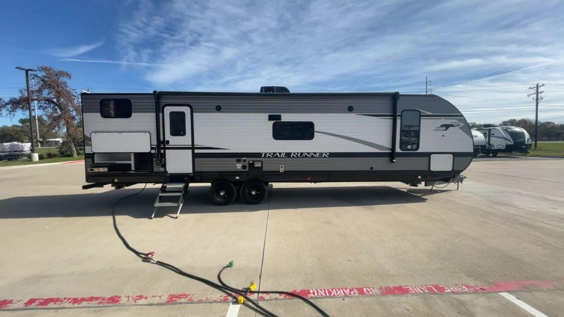 2022 HEARTLAND TRAIL RUNNER 31DB (5SFEB3721NE) , Length: 36.92 ft. | Dry Weight: 7,040 lbs. | Gross Weight: 9,642 lbs. | Slides: 1 transmission, located at 4319 N Main St, Cleburne, TX, 76033, (817) 678-5133, 32.385960, -97.391212 - Looking for the perfect travel trailer to explore the local driving highlights around Cleburne, TX? Look no further than this 2022 Heartland Trail Runner 31DB available at RV Depot in Cleburne, TX. With its spacious interior, comfortable amenities, and durable construction, this travel trailer is re - Photo#2