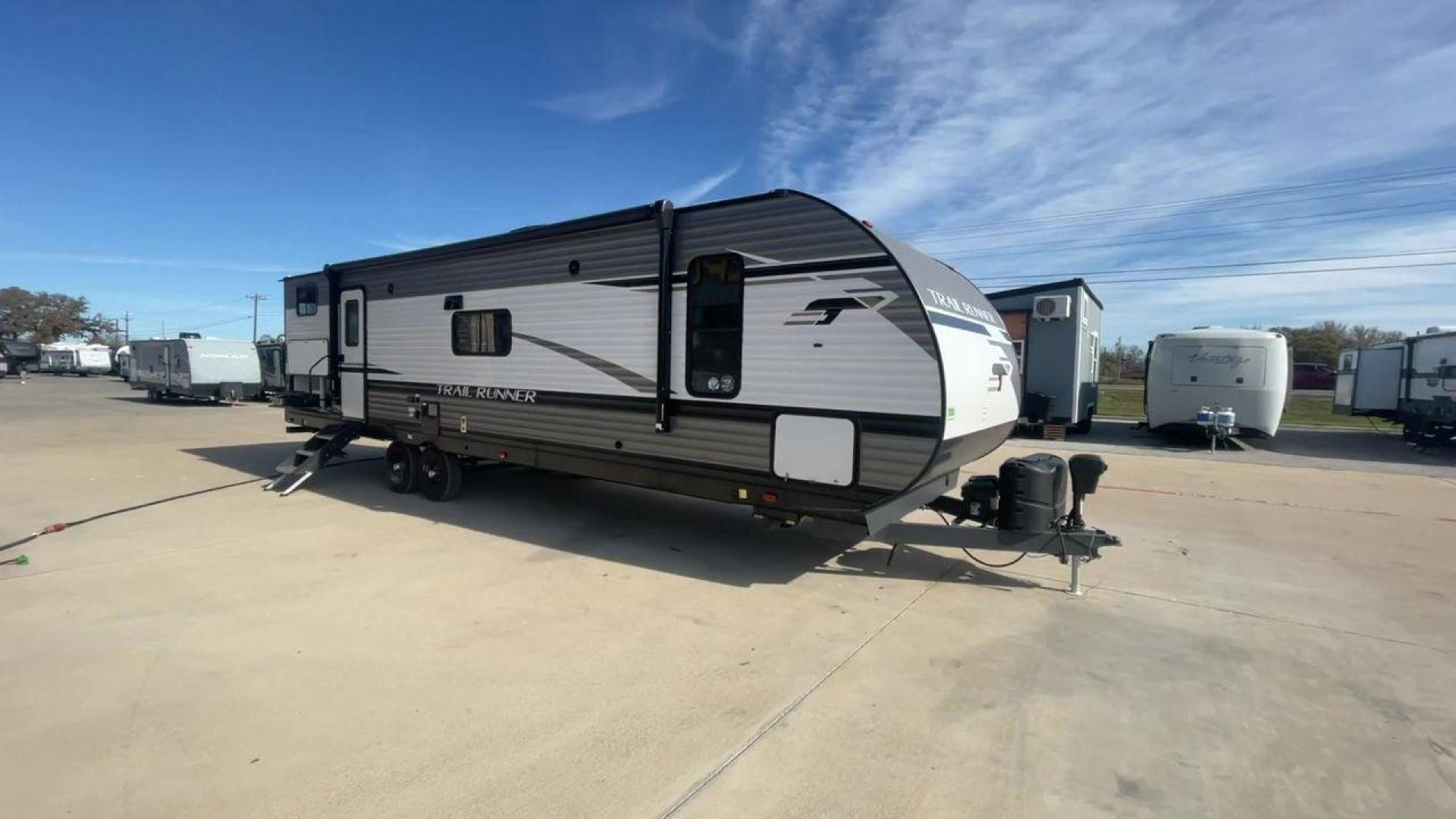 2022 HEARTLAND TRAIL RUNNER 31DB (5SFEB3721NE) , Length: 36.92 ft. | Dry Weight: 7,040 lbs. | Gross Weight: 9,642 lbs. | Slides: 1 transmission, located at 4319 N Main St, Cleburne, TX, 76033, (817) 678-5133, 32.385960, -97.391212 - Looking for the perfect travel trailer to explore the local driving highlights around Cleburne, TX? Look no further than this 2022 Heartland Trail Runner 31DB available at RV Depot in Cleburne, TX. With its spacious interior, comfortable amenities, and durable construction, this travel trailer is re - Photo#3