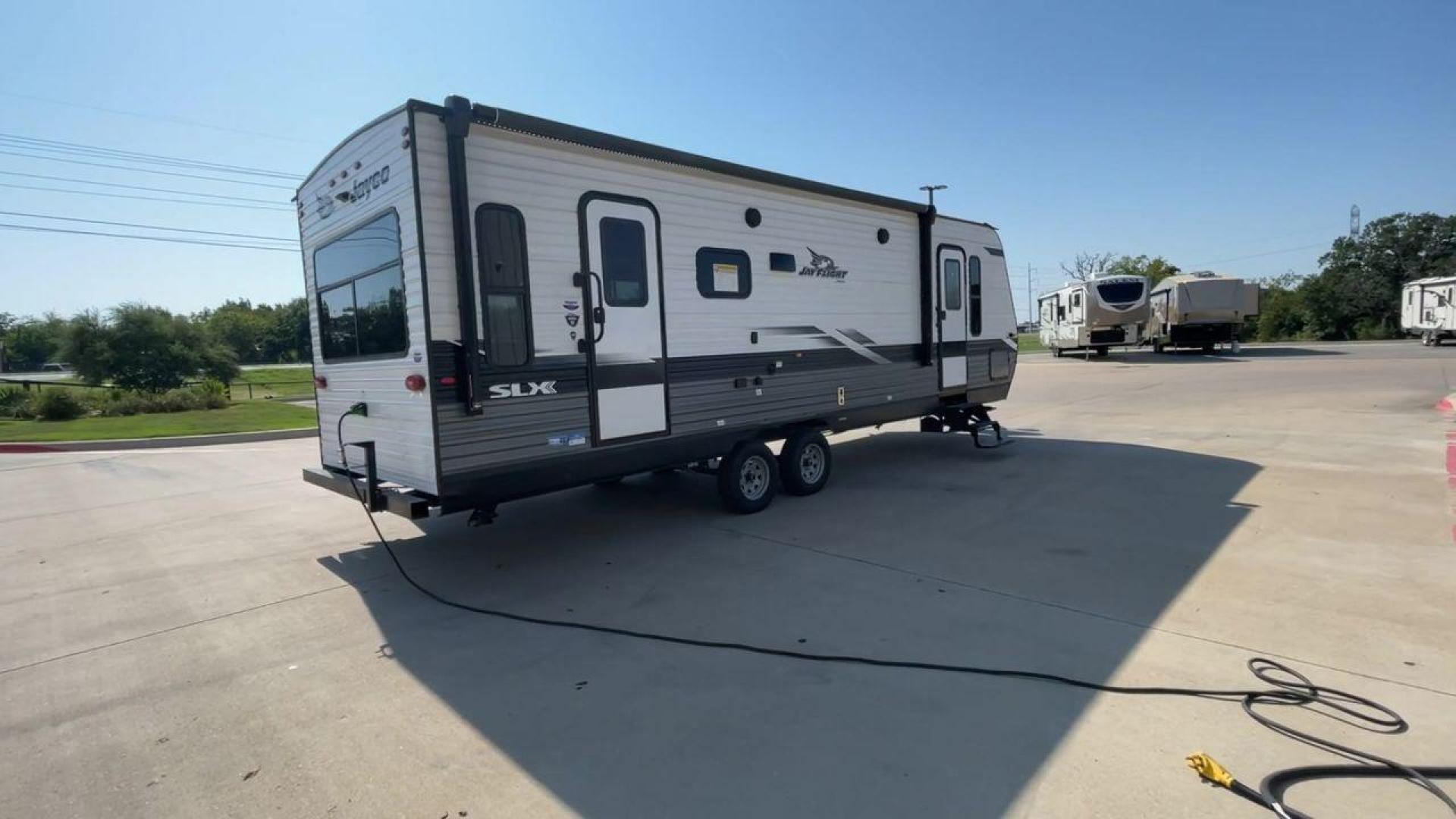 2022 JAYCO JAYFLIGHT 265RLS (1UJBJ0BP5N1) , Length: 31.08 ft. | Dry Weight: 5,990 lbs. | Gross Weight: 7,150 lbs. | Slides: 1 transmission, located at 4319 N Main St, Cleburne, TX, 76033, (817) 678-5133, 32.385960, -97.391212 - Photo#1