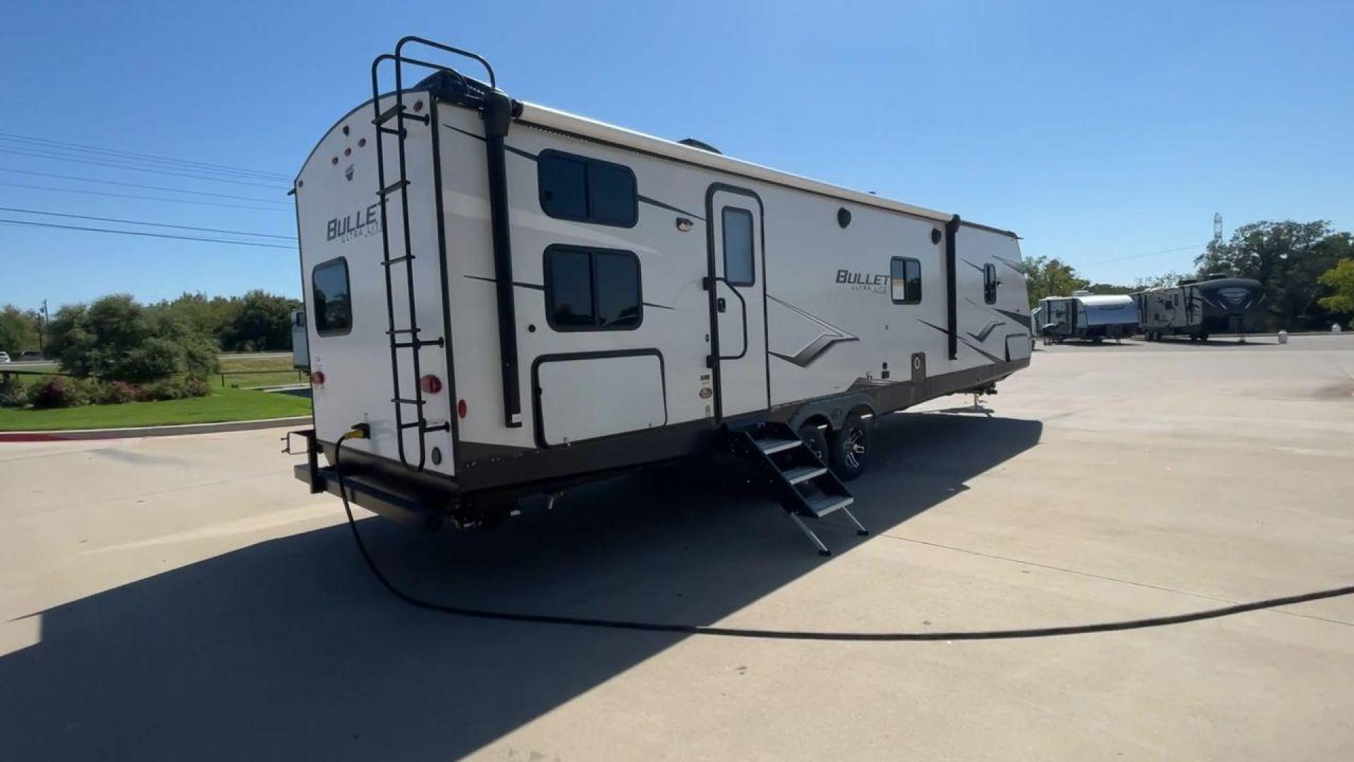 2022 KEYSTONE BULLET 331BHS (4YDTBLR2XNT) , Length: 37.5 ft. | Dry Weight: 6,898 lbs. | Gross Weight: 9,200 lbs. | Slides: 2 transmission, located at 4319 N Main St, Cleburne, TX, 76033, (817) 678-5133, 32.385960, -97.391212 - Measuring at an impressive length of 37.5 feet, the Bullet 331BHS provides ample space for relaxation and entertainment. Despite its generous size, it maintains a manageable dry weight of 6,898 lbs., making it towable by a wide range of vehicles. With a gross weight of 9,200 lbs. and two slide-outs, - Photo#1