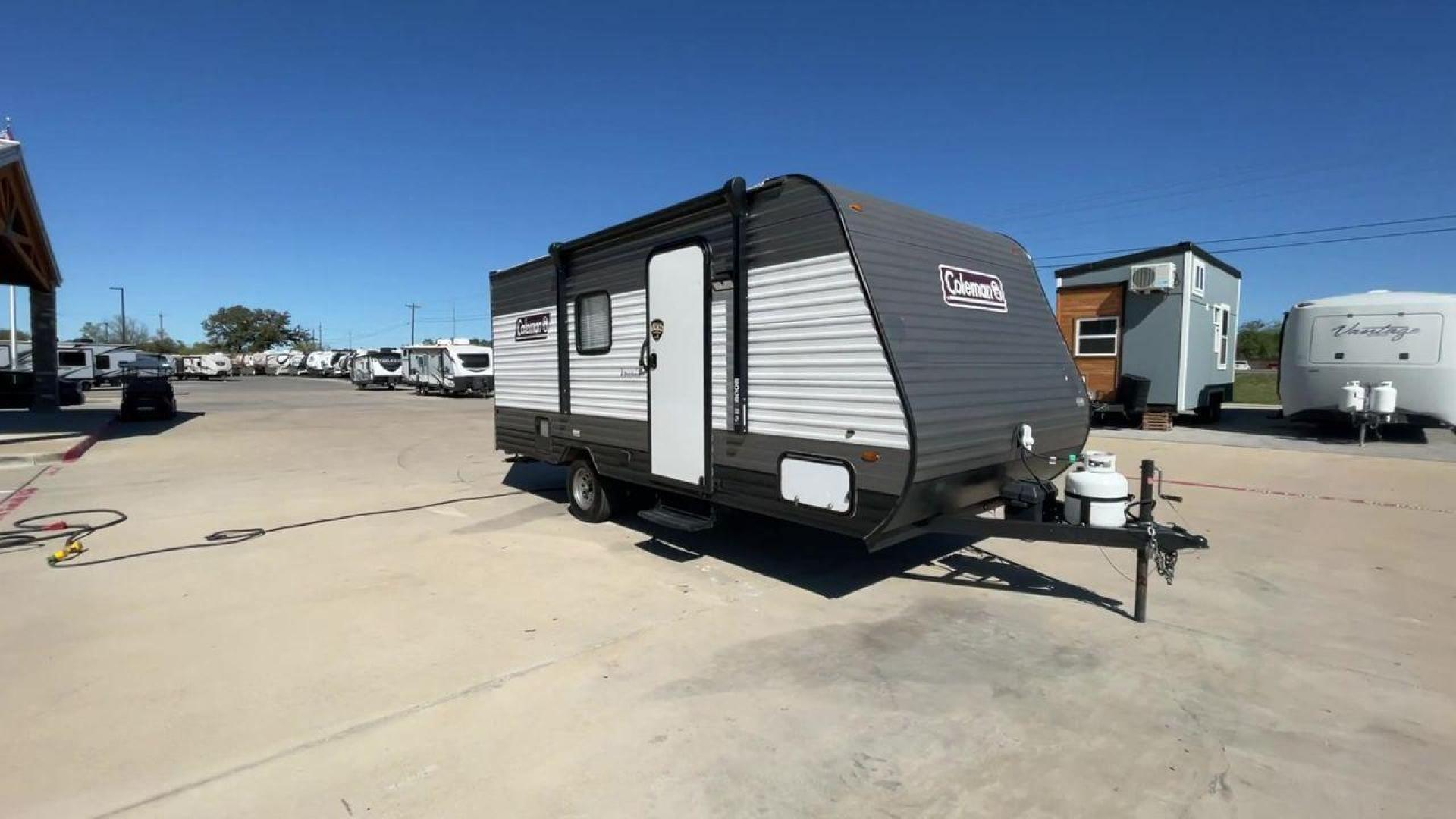 2022 KEYSTONE COLEMAN 17BH (4YDTCMG19NJ) , Length: 21.42 ft | Dry Weight: 2,986 lbs. | Slides: 0 transmission, located at 4319 N Main St, Cleburne, TX, 76033, (817) 678-5133, 32.385960, -97.391212 - The 2022 Dutchmen Coleman 17BH travel trailer offers the ideal balance of comfort and convenience. Designed to accommodate the entire family, this tiny yet large trailer includes a queen bed and bunk beds in the back, ensuring that everyone has their own cozy spot to rest after a day of activity. Th - Photo#3