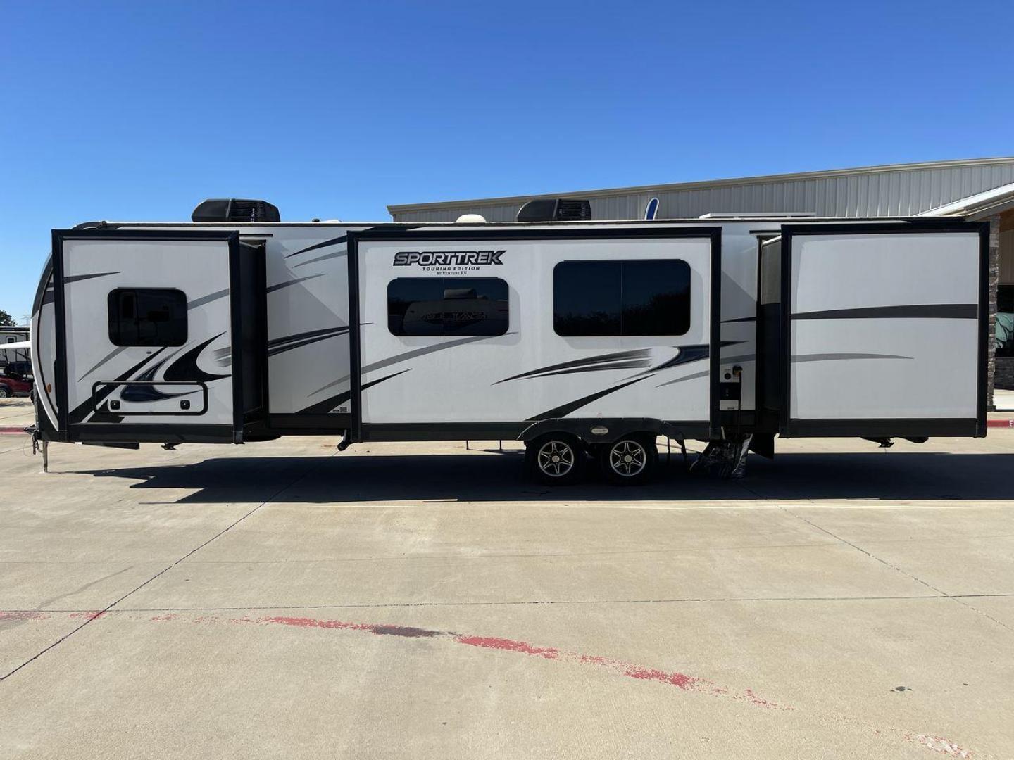 2022 KZ SPORT TREK 343VBH (4EZT13423N8) , Length: 37.67 ft. | Dry Weight: 8,820 lbs. | Slides: 3 transmission, located at 4319 N Main St, Cleburne, TX, 76033, (817) 678-5133, 32.385960, -97.391212 - The 2022 Venture RV Sport Trek 343VBH showcases a sleek and modern exterior with a bright white finish and stylish graphics. It stretches an impressive 37.67 feet. This unit is equipped with a power tongue jack and propane tanks at the front for easy hitching and extended camping capabilities. The s - Photo#23