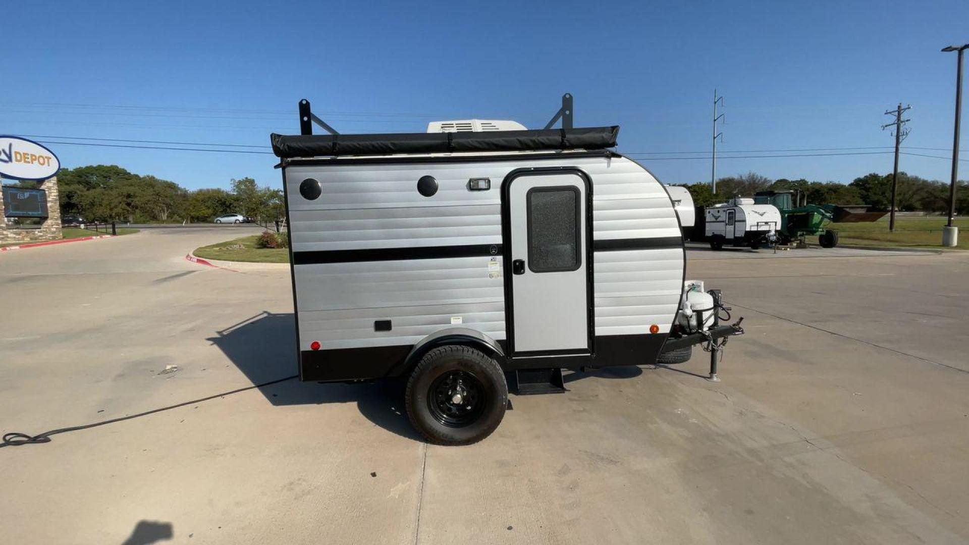 2022 RIVERSIDE RETRO 511 (59CCC1211NL) , Length: 12.67 ft. | Dry Weight: 1,540 lbs. transmission, located at 4319 N Main St, Cleburne, TX, 76033, (817) 678-5133, 32.385960, -97.391212 - The 2022 Riverside Retro 511 is a charming, compact travel trailer that captures the essence of vintage camping with modern amenities. Measuring just 12.67 feet in length and weighing a lightweight 1,540 pounds, this teardrop-shaped trailer is easily towable by a wide range of vehicles. This makes i - Photo#2