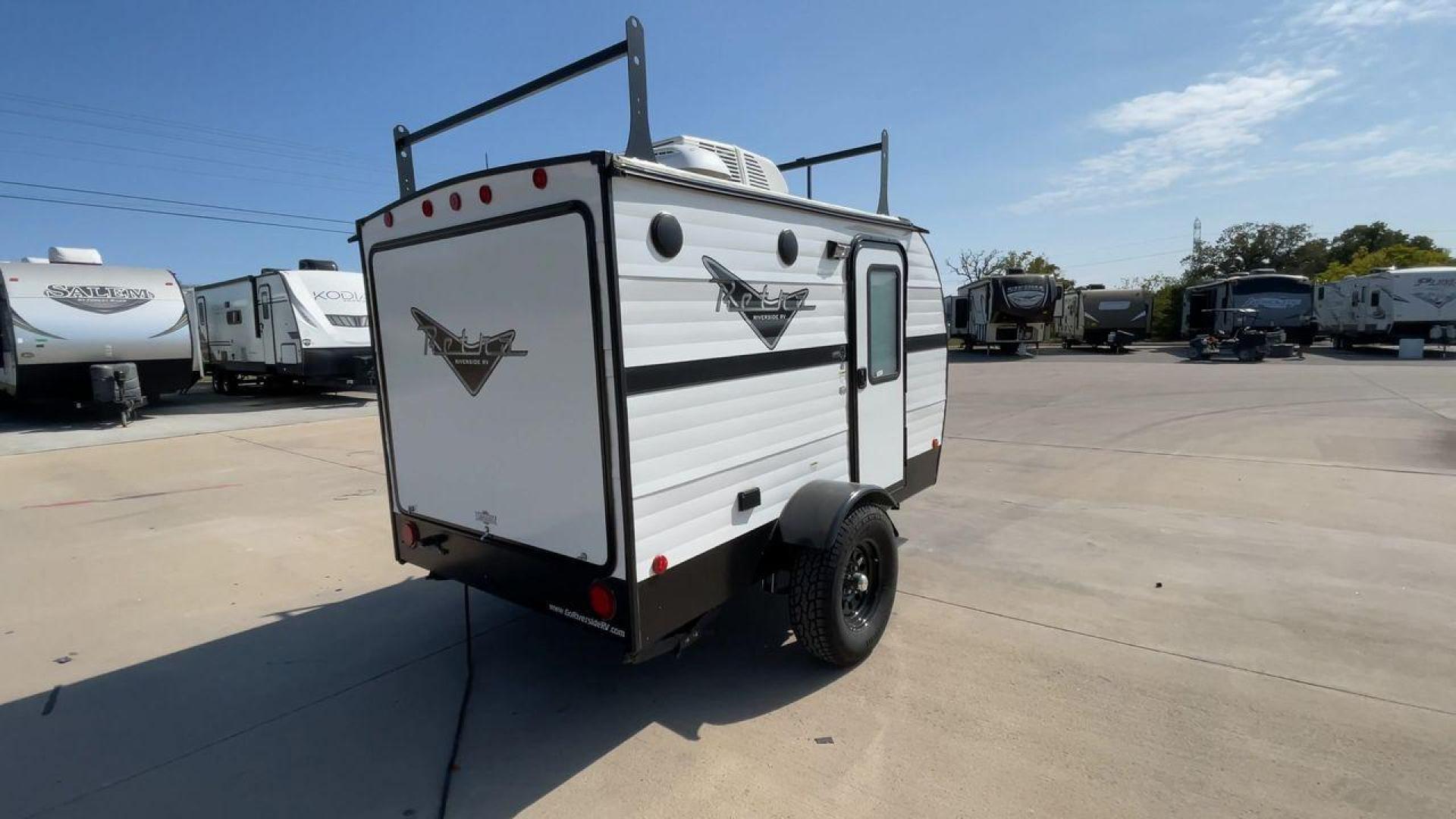 2022 RIVERSIDE RETRO 511 (59CCC1213NL) , Length: 12.67 ft. | Dry Weight: 1,540 lbs. transmission, located at 4319 N Main St, Cleburne, TX, 76033, (817) 678-5133, 32.385960, -97.391212 - The 2022 Riverside Retro 511 is a charming, compact travel trailer that captures the essence of vintage camping with modern amenities. Measuring just 12.67 feet in length and weighing a lightweight 1,540 pounds, this teardrop-shaped trailer is easily towable by a wide range of vehicles. This makes i - Photo#1