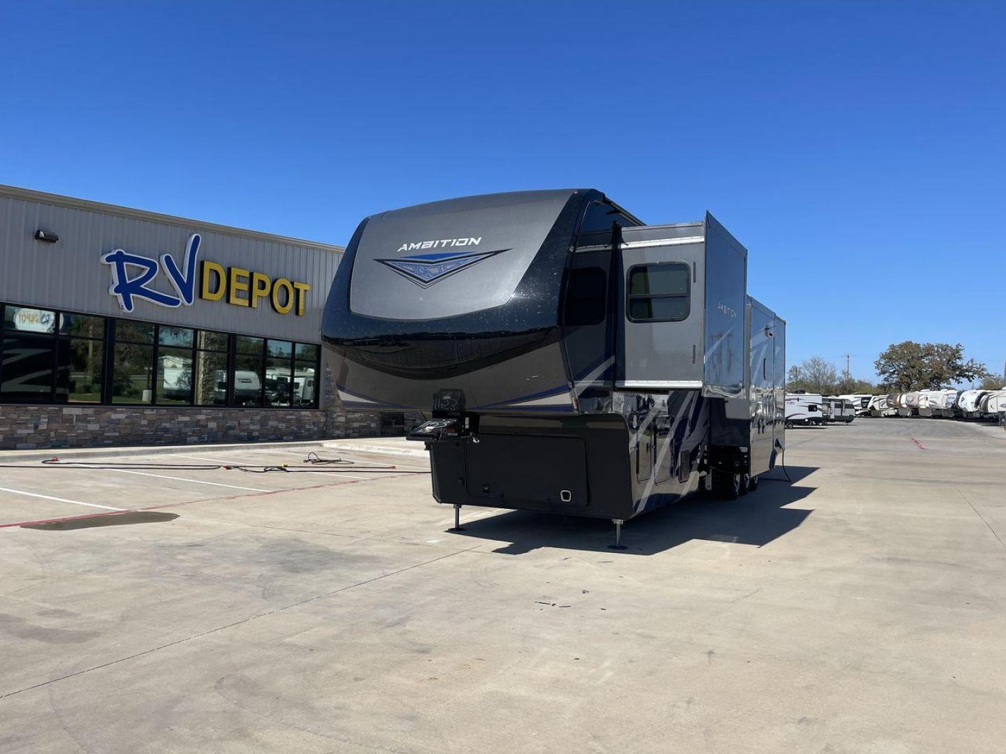 2022 VANLEIGH AMBITION 399TH (7HHAC4333NV) , Length: 43.58 ft. | Dry Weight: 16,900 lbs. | Gross Weight: 21,000 lbs. | Slides: 2 transmission, located at 4319 N Main St, Cleburne, TX, 76033, (817) 678-5133, 32.385960, -97.391212 - Brace yourself for some wild and thrilling adventures in this 2022 Vanleigh Ambition 399TH! This big and spacious toy hauler measures 43.58 ft. in length and 13.08 ft. in height. It has a dry weight of 16,900 lbs. and a GVWR of 21,000 lbs. It also has a hitch weight of 3,500 lbs. which makes it t - Photo#0