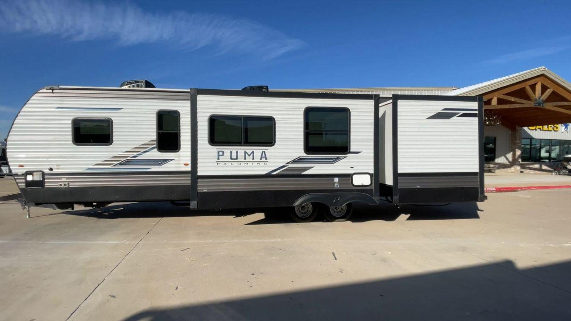 2023 FOREST RIVER PUMA 32BH2B (4X4TPUH21PP) , Length: 38.5 ft. | Dry Weight: 9,023 lbs. | Gross Weight: 11,230 lbs | Slides: 3 transmission, located at 4319 N Main St, Cleburne, TX, 76033, (817) 678-5133, 32.385960, -97.391212 - With its ample space and adaptability, the 2023 Palomino Puma 32BH2B travel trailer is perfect for hosting extended families and gatherings. This model provides generous living space while maintaining excellent maneuverability on the road. It measures 38.5 feet in length and has a dry weight of 9,02 - Photo#6