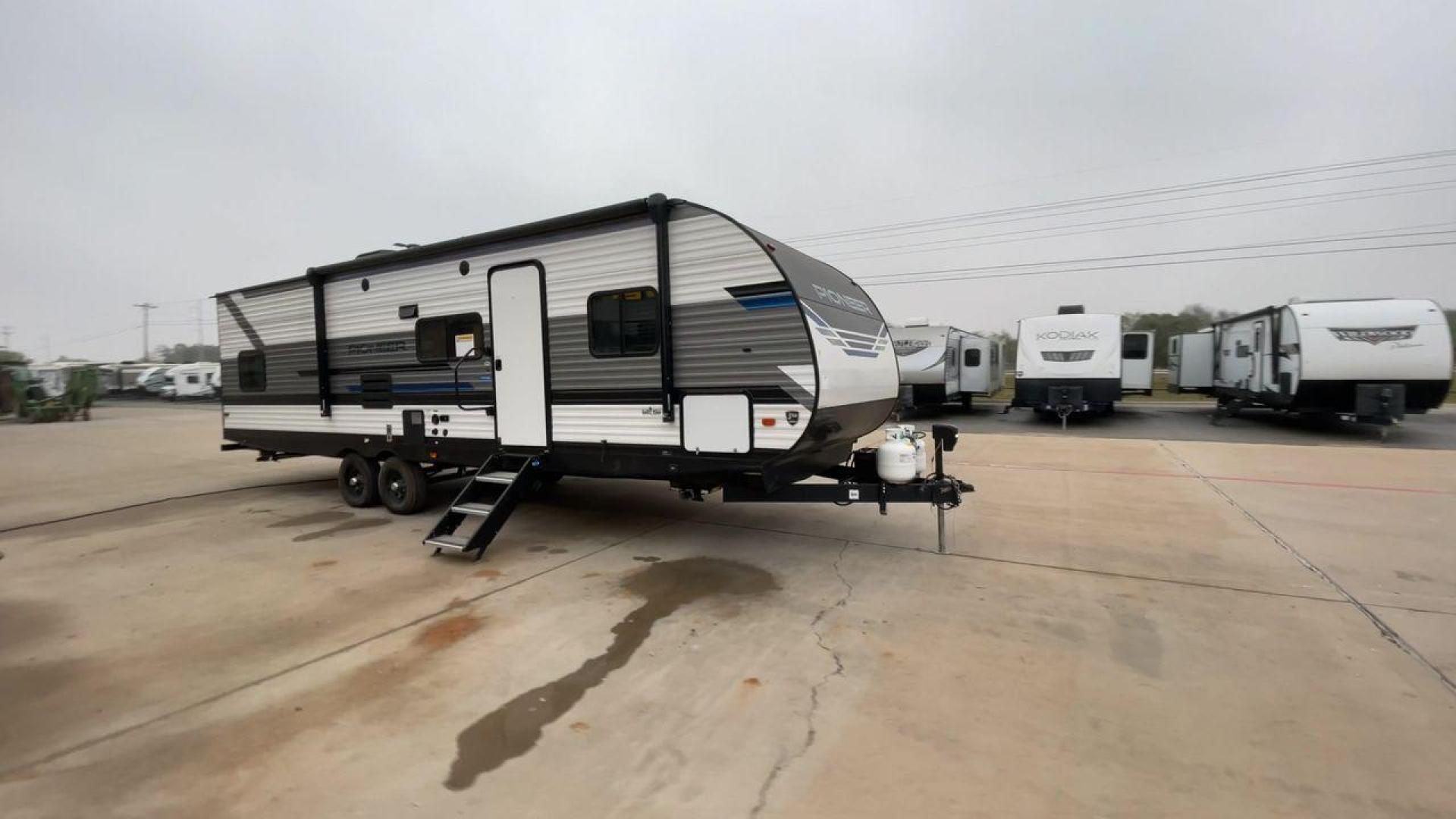 2023 HEARTLAND PIONEER QB300 (5SFPB3524PE) , Length: 35 ft. | Dry Weight: 6,896 lbs. | Gross Weight: 9,000 lbs. | Slides: 1 transmission, located at 4319 N Main St, Cleburne, TX, 76033, (817) 678-5133, 32.385960, -97.391212 - The 2023 Heartland Pioneer QB300 is a spacious travel trailer, perfect for family adventures. Measuring 35 feet in length, it features a single slideout, which significantly expands the interior space, creating a comfortable living environment. With a dry weight of 6,896 lbs and a gross weight of 9, - Photo#3