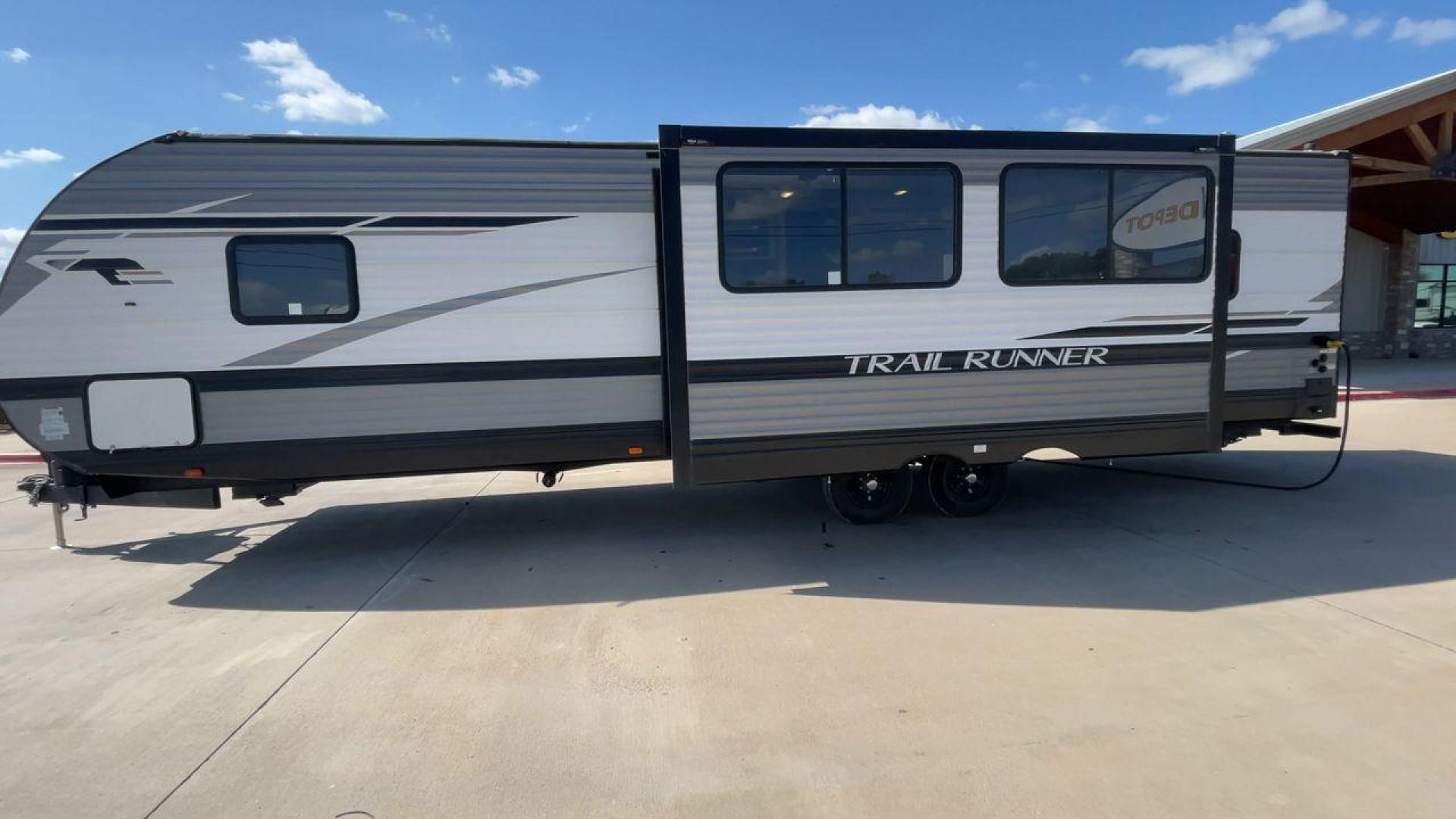 2023 HEARTLAND TRAIL RUNNER 31DB (5SFEB3723PE) , Length: 36.92 ft | Dry Weight: 7,040 lbs | GVWR: 9,642 lbs | Slides: 1 transmission, located at 4319 N Main St, Cleburne, TX, 76033, (817) 678-5133, 32.385960, -97.391212 - The 2023 Heartland Trail Runner 31DB is a versatile and spacious travel trailer designed for families and adventure enthusiasts. This vehicle is the perfect option for families or groups looking to embark on memorable road trips. The travel trailer is a bunkhouse, and features a family-centric layou - Photo#6