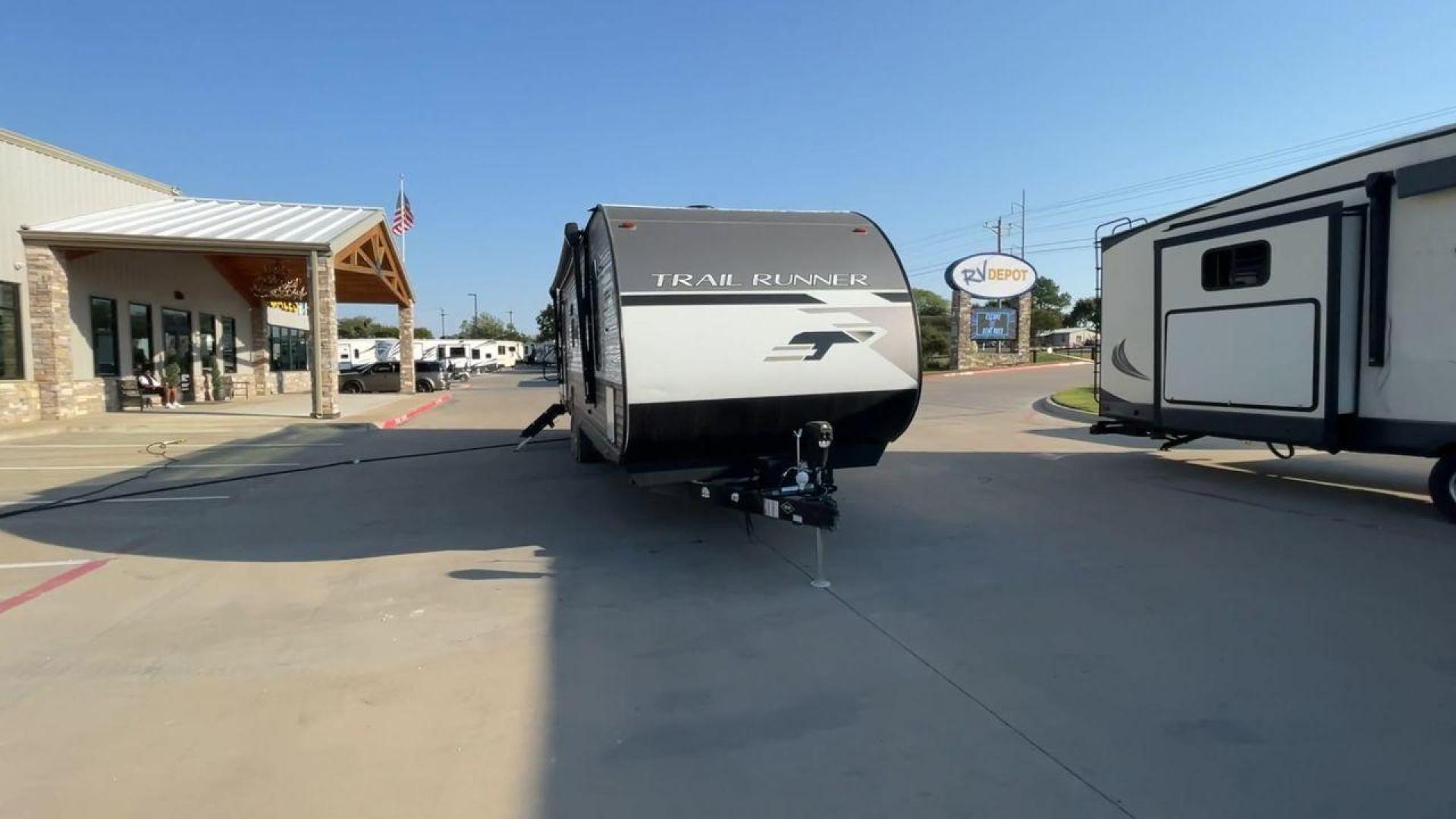 2023 HEARTLAND TRAIL RUNNER 31DB (5SFEB3722PE) , Length: 36.92 ft | Dry Weight: 7,040 lbs | GVWR: 9,642 lbs | Slides: 1 transmission, located at 4319 N Main St, Cleburne, TX, 76033, (817) 678-5133, 32.385960, -97.391212 - The 2023 Heartland Trail Runner 31DB is a versatile and spacious travel trailer designed for families and adventure enthusiasts. This vehicle is the perfect option for families or groups looking to embark on memorable road trips. The travel trailer is a bunkhouse, and features a family-centric layou - Photo#4