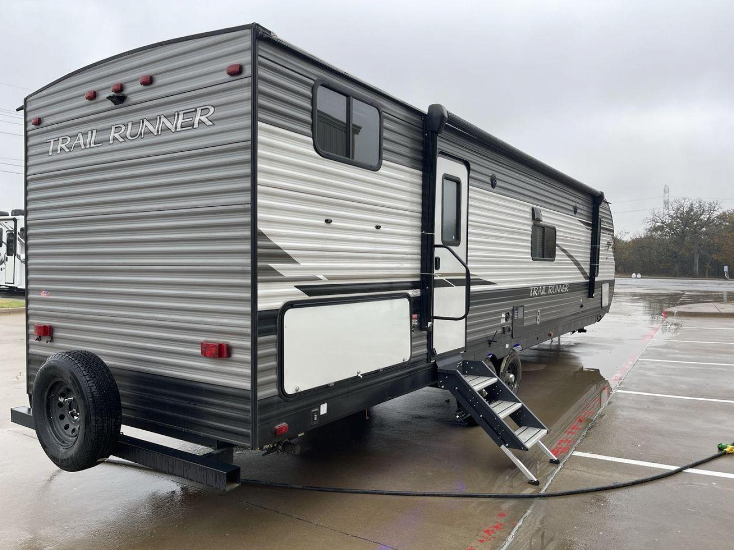 2023 HEARTLAND TRAIL RUNNER 31DB (5SFEB3729PE) , Length: 36.92 ft | Dry Weight: 7,040 lbs | GVWR: 9,642 lbs | Slides: 1 transmission, located at 4319 N Main St, Cleburne, TX, 76033, (817) 678-5133, 32.385960, -97.391212 - The 2023 Heartland Trail Runner 31DB is a versatile and spacious travel trailer designed for families and adventure enthusiasts. This vehicle is the perfect option for families or groups looking to embark on memorable road trips. The travel trailer is a bunkhouse, and features a family-centric layou - Photo#25