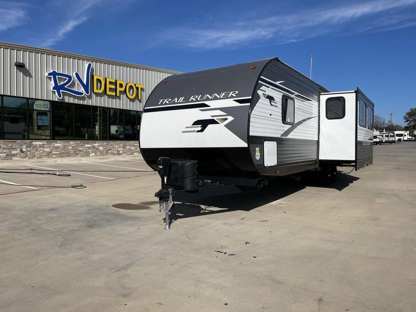 2023 HEARTLAND TRAIL RUNNER 31DB (5SFEB3720PE) , Length: 36.92 ft | Dry Weight: 7,040 lbs | GVWR: 9,642 lbs | Slides: 1 transmission, located at 4319 N Main St, Cleburne, TX, 76033, (817) 678-5133, 32.385960, -97.391212 - Are you looking for the perfect travel trailer to embark on your next adventure? Look no further than this stunning 2023 Heartland Trail Runner 31DB, available for sale at RV Depot in Cleburne, TX. With its exceptional features and unbeatable price of $37,995, this travel trailer is the epitome of l - Photo#0