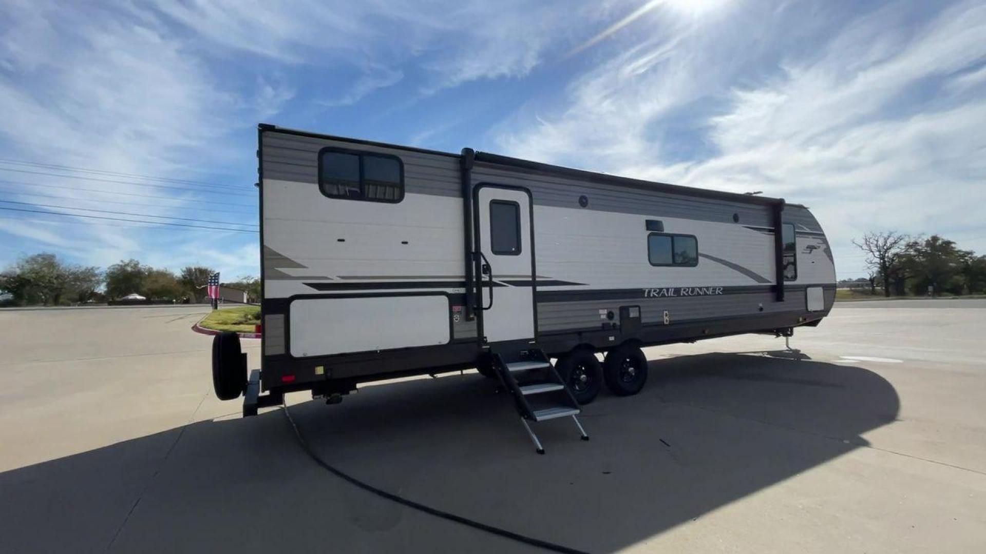 2023 HEARTLAND TRAIL RUNNER 31DB (5SFEB3720PE) , Length: 36.92 ft | Dry Weight: 7,040 lbs | GVWR: 9,642 lbs | Slides: 1 transmission, located at 4319 N Main St, Cleburne, TX, 76033, (817) 678-5133, 32.385960, -97.391212 - Are you looking for the perfect travel trailer to embark on your next adventure? Look no further than this stunning 2023 Heartland Trail Runner 31DB, available for sale at RV Depot in Cleburne, TX. With its exceptional features and unbeatable price of $37,995, this travel trailer is the epitome of l - Photo#1