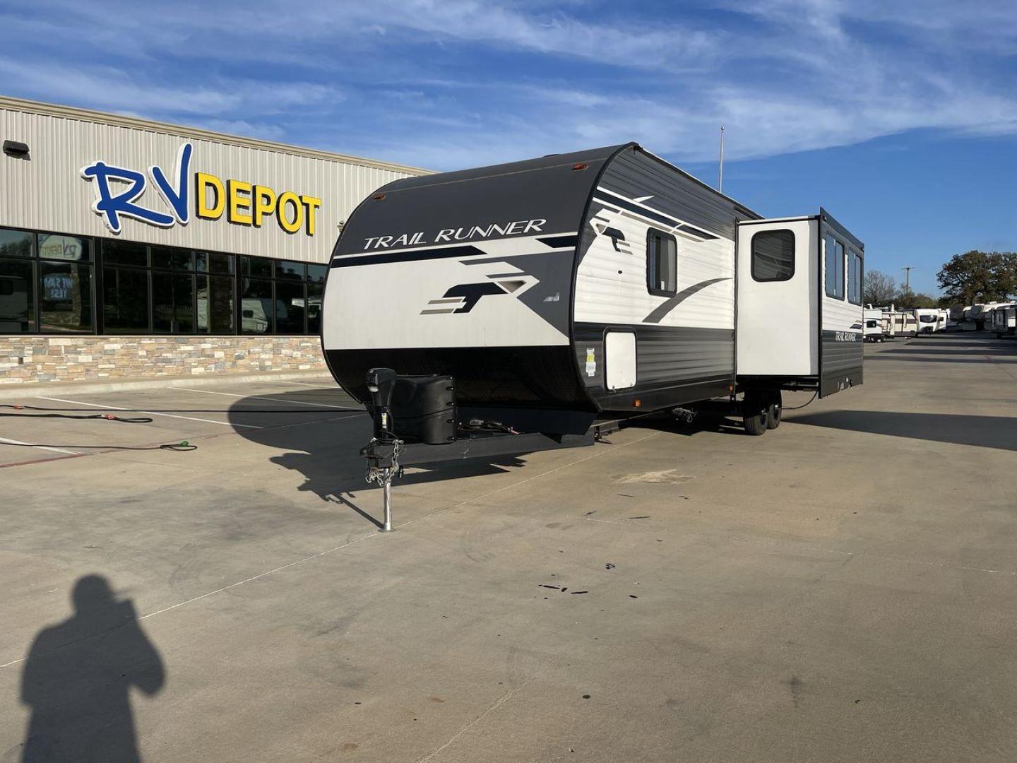 2023 HEARTLAND TRAIL RUNNER 31DB (5SFEB3726PE) , Length: 36.92 ft | Dry Weight: 7,040 lbs | GVWR: 9,642 lbs | Slides: 1 transmission, located at 4319 N Main St, Cleburne, TX, 76033, (817) 678-5133, 32.385960, -97.391212 - The 2023 Heartland Trail Runner 31DB is a versatile and spacious travel trailer designed for families and adventure enthusiasts. This vehicle is the perfect option for families or groups looking to embark on memorable road trips. The travel trailer is a bunkhouse, and features a family-centric layou - Photo#0