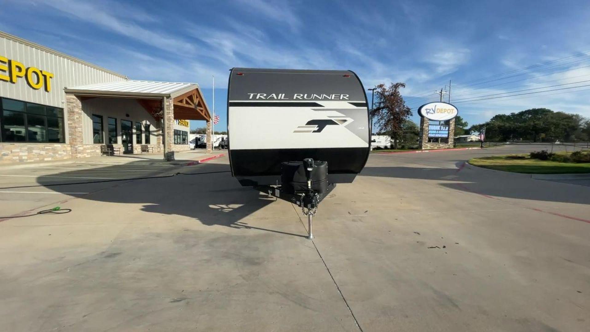 2023 HEARTLAND TRAIL RUNNER 31DB (5SFEB3726PE) , Length: 36.92 ft | Dry Weight: 7,040 lbs | GVWR: 9,642 lbs | Slides: 1 transmission, located at 4319 N Main St, Cleburne, TX, 76033, (817) 678-5133, 32.385960, -97.391212 - The 2023 Heartland Trail Runner 31DB is a versatile and spacious travel trailer designed for families and adventure enthusiasts. This vehicle is the perfect option for families or groups looking to embark on memorable road trips. The travel trailer is a bunkhouse, and features a family-centric layou - Photo#4