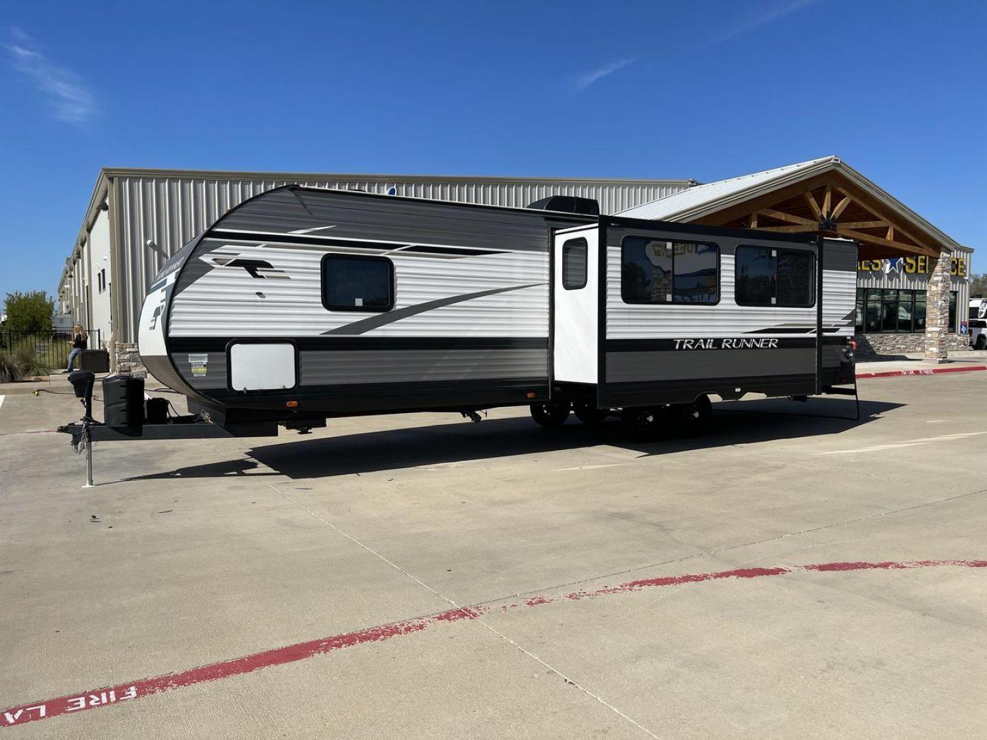 2023 HEARTLAND TRAIL RUNNER 31DB (5SFEB3729PE) , Length: 36.92 ft | Dry Weight: 7,040 lbs | GVWR: 9,642 lbs | Slides: 1 transmission, located at 4319 N Main St, Cleburne, TX, 76033, (817) 678-5133, 32.385960, -97.391212 - The 2023 Heartland Trail Runner 31DB is a versatile and spacious travel trailer designed for families and adventure enthusiasts. This vehicle is the perfect option for families or groups looking to embark on memorable road trips. The travel trailer is a bunkhouse, and features a family-centric layou - Photo#26