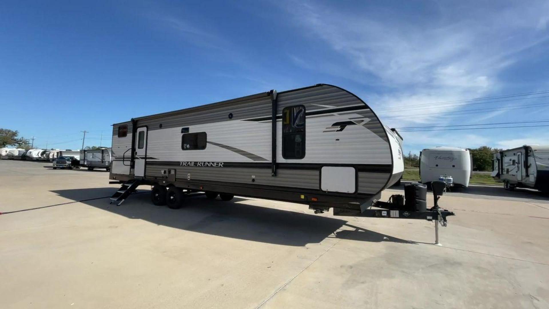 2023 HEARTLAND TRAIL RUNNER 31DB (5SFEB3729PE) , Length: 36.92 ft | Dry Weight: 7,040 lbs | GVWR: 9,642 lbs | Slides: 1 transmission, located at 4319 N Main St, Cleburne, TX, 76033, (817) 678-5133, 32.385960, -97.391212 - The 2023 Heartland Trail Runner 31DB is a versatile and spacious travel trailer designed for families and adventure enthusiasts. This vehicle is the perfect option for families or groups looking to embark on memorable road trips. The travel trailer is a bunkhouse, and features a family-centric layou - Photo#3