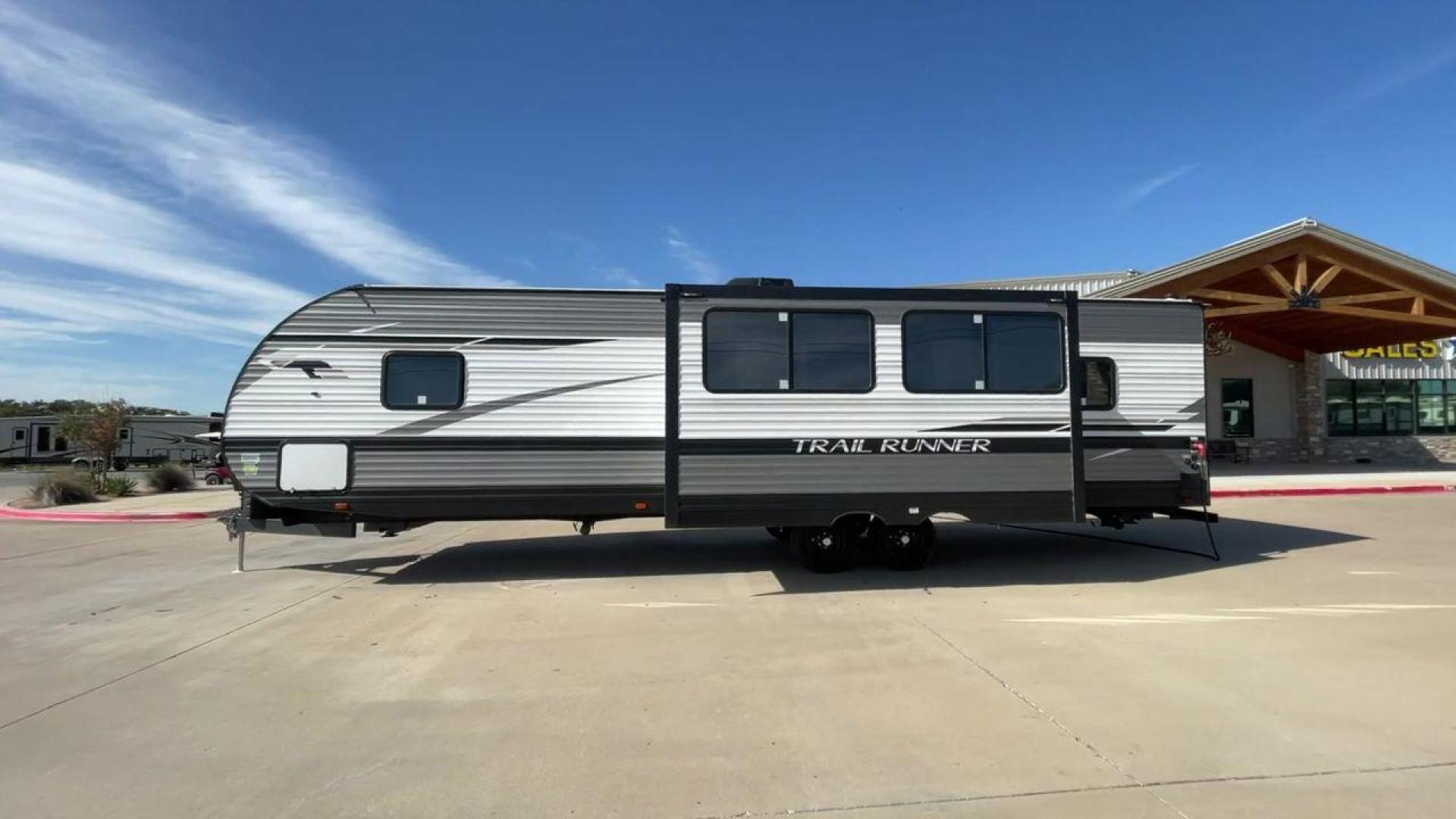 2023 HEARTLAND TRAIL RUNNER 31DB (5SFEB3729PE) , Length: 36.92 ft | Dry Weight: 7,040 lbs | GVWR: 9,642 lbs | Slides: 1 transmission, located at 4319 N Main St, Cleburne, TX, 76033, (817) 678-5133, 32.385960, -97.391212 - The 2023 Heartland Trail Runner 31DB is a versatile and spacious travel trailer designed for families and adventure enthusiasts. This vehicle is the perfect option for families or groups looking to embark on memorable road trips. The travel trailer is a bunkhouse, and features a family-centric layou - Photo#6