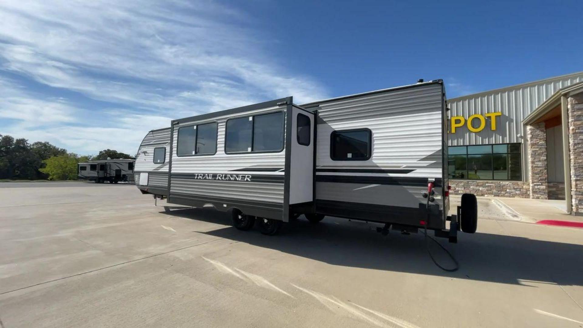 2023 HEARTLAND TRAIL RUNNER 31DB (5SFEB3729PE) , Length: 36.92 ft | Dry Weight: 7,040 lbs | GVWR: 9,642 lbs | Slides: 1 transmission, located at 4319 N Main St, Cleburne, TX, 76033, (817) 678-5133, 32.385960, -97.391212 - The 2023 Heartland Trail Runner 31DB is a versatile and spacious travel trailer designed for families and adventure enthusiasts. This vehicle is the perfect option for families or groups looking to embark on memorable road trips. The travel trailer is a bunkhouse, and features a family-centric layou - Photo#7