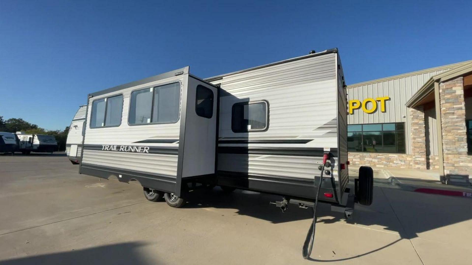 2023 HEARTLAND TRAIL RUNNER 31DB (5SFEB372XPE) , Length: 36.92 ft | Dry Weight: 7,040 lbs | GVWR: 9,642 lbs | Slides: 1 transmission, located at 4319 N Main St, Cleburne, TX, 76033, (817) 678-5133, 32.385960, -97.391212 - The 2023 Heartland Trail Runner 31DB is a versatile and spacious travel trailer designed for families and adventure enthusiasts. This vehicle is the perfect option for families or groups looking to embark on memorable road trips. The travel trailer is a bunkhouse, and features a family-centric layou - Photo#1