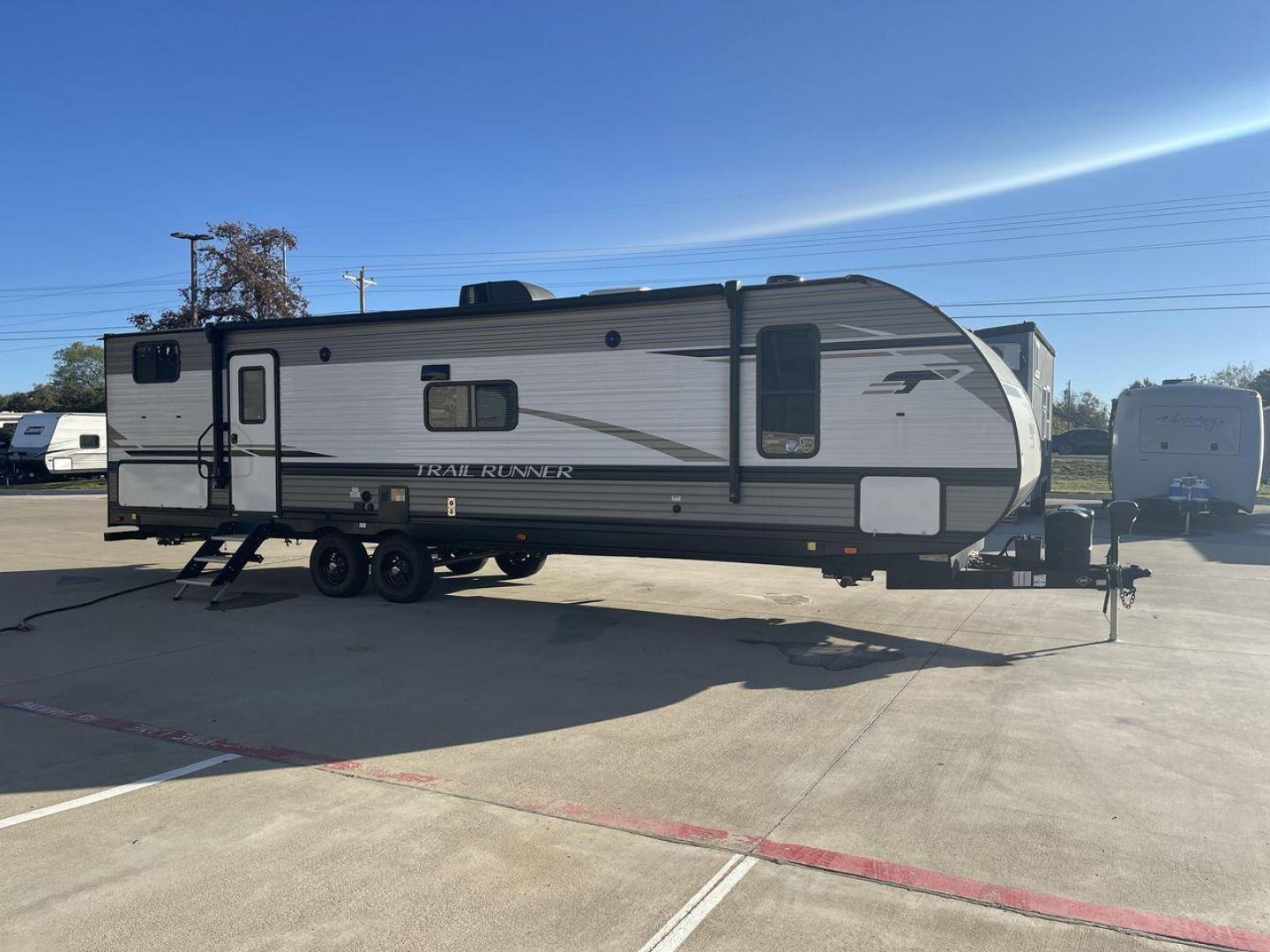 2023 HEARTLAND TRAIL RUNNER 31DB (5SFEB372XPE) , Length: 36.92 ft | Dry Weight: 7,040 lbs | GVWR: 9,642 lbs | Slides: 1 transmission, located at 4319 N Main St, Cleburne, TX, 76033, (817) 678-5133, 32.385960, -97.391212 - The 2023 Heartland Trail Runner 31DB is a versatile and spacious travel trailer designed for families and adventure enthusiasts. This vehicle is the perfect option for families or groups looking to embark on memorable road trips. The travel trailer is a bunkhouse, and features a family-centric layou - Photo#25