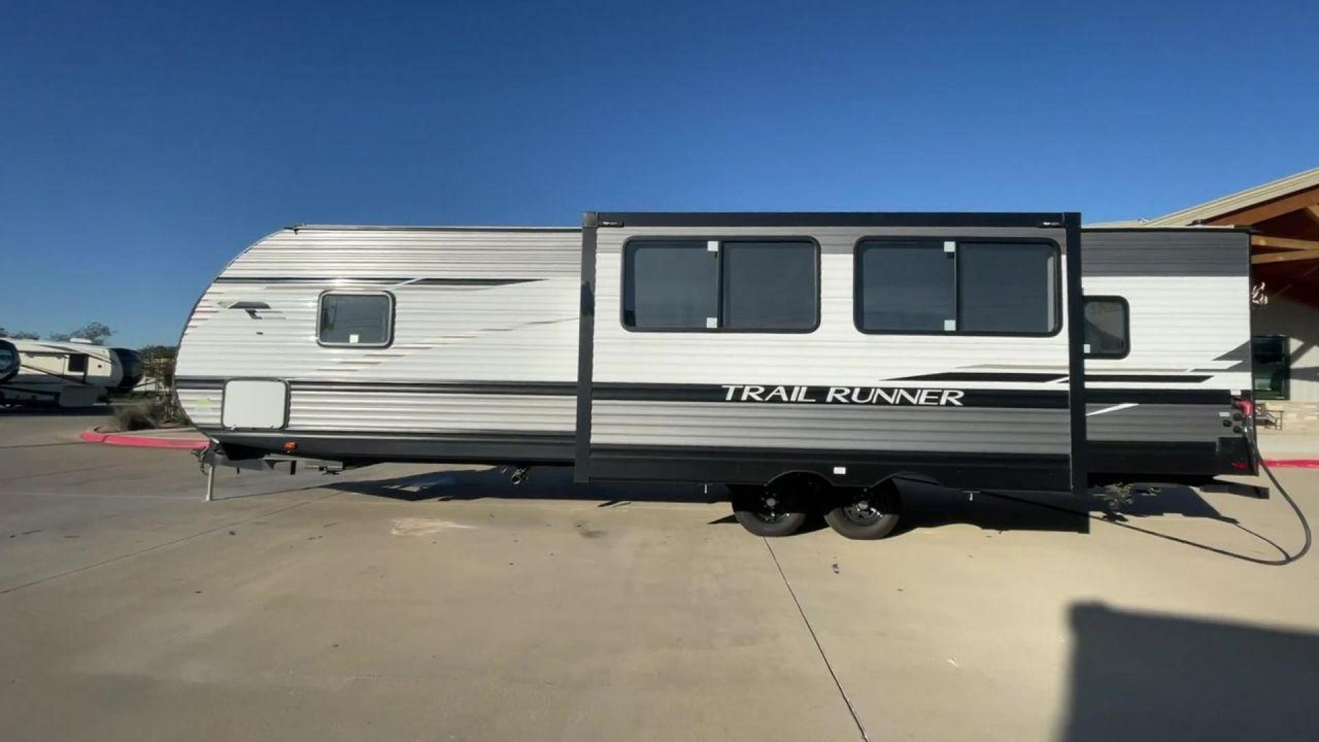 2023 HEARTLAND TRAIL RUNNER 31DB (5SFEB372XPE) , Length: 36.92 ft | Dry Weight: 7,040 lbs | GVWR: 9,642 lbs | Slides: 1 transmission, located at 4319 N Main St, Cleburne, TX, 76033, (817) 678-5133, 32.385960, -97.391212 - The 2023 Heartland Trail Runner 31DB is a versatile and spacious travel trailer designed for families and adventure enthusiasts. This vehicle is the perfect option for families or groups looking to embark on memorable road trips. The travel trailer is a bunkhouse, and features a family-centric layou - Photo#2