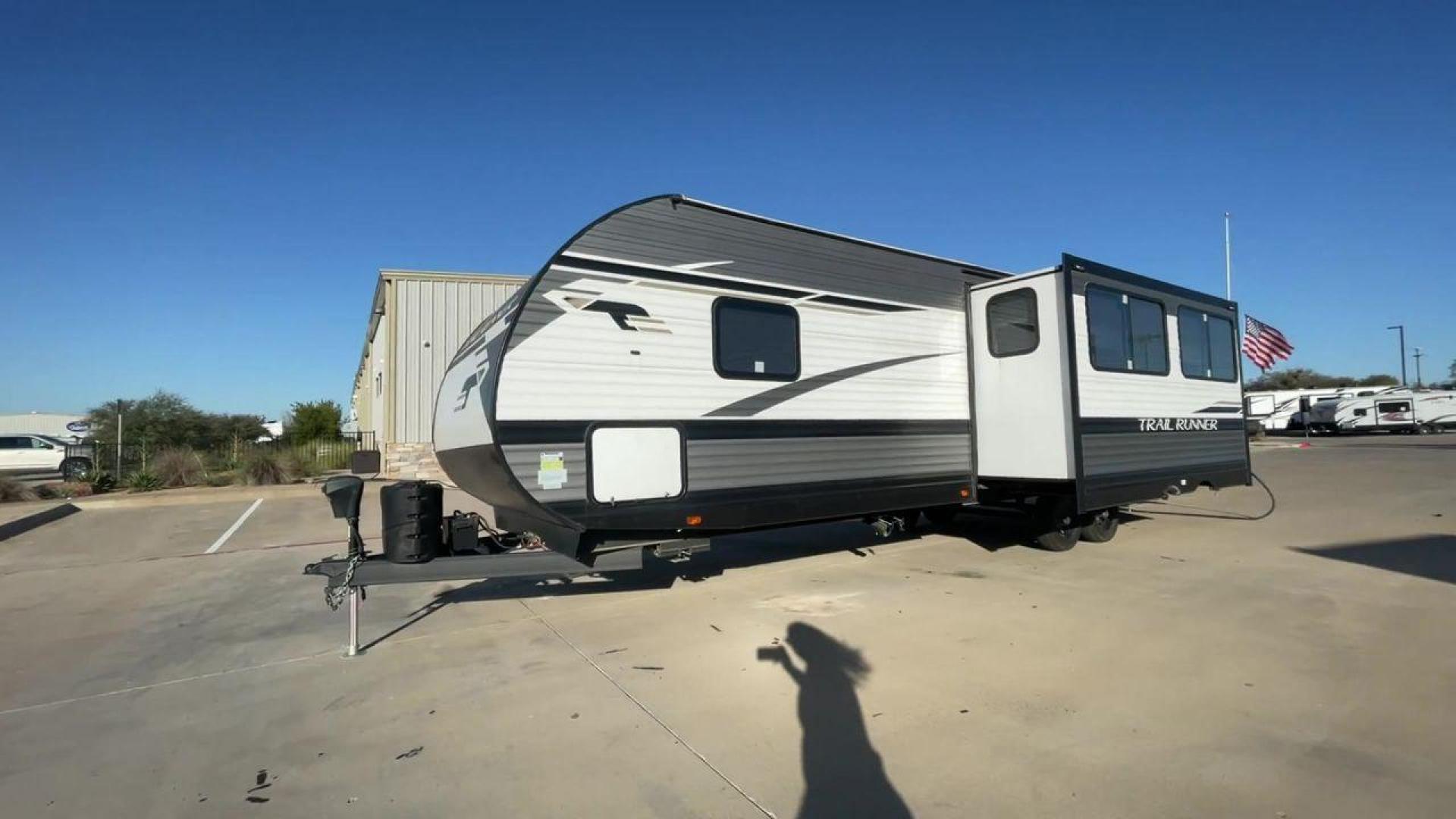 2023 HEARTLAND TRAIL RUNNER 31DB (5SFEB372XPE) , Length: 36.92 ft | Dry Weight: 7,040 lbs | GVWR: 9,642 lbs | Slides: 1 transmission, located at 4319 N Main St, Cleburne, TX, 76033, (817) 678-5133, 32.385960, -97.391212 - The 2023 Heartland Trail Runner 31DB is a versatile and spacious travel trailer designed for families and adventure enthusiasts. This vehicle is the perfect option for families or groups looking to embark on memorable road trips. The travel trailer is a bunkhouse, and features a family-centric layou - Photo#3