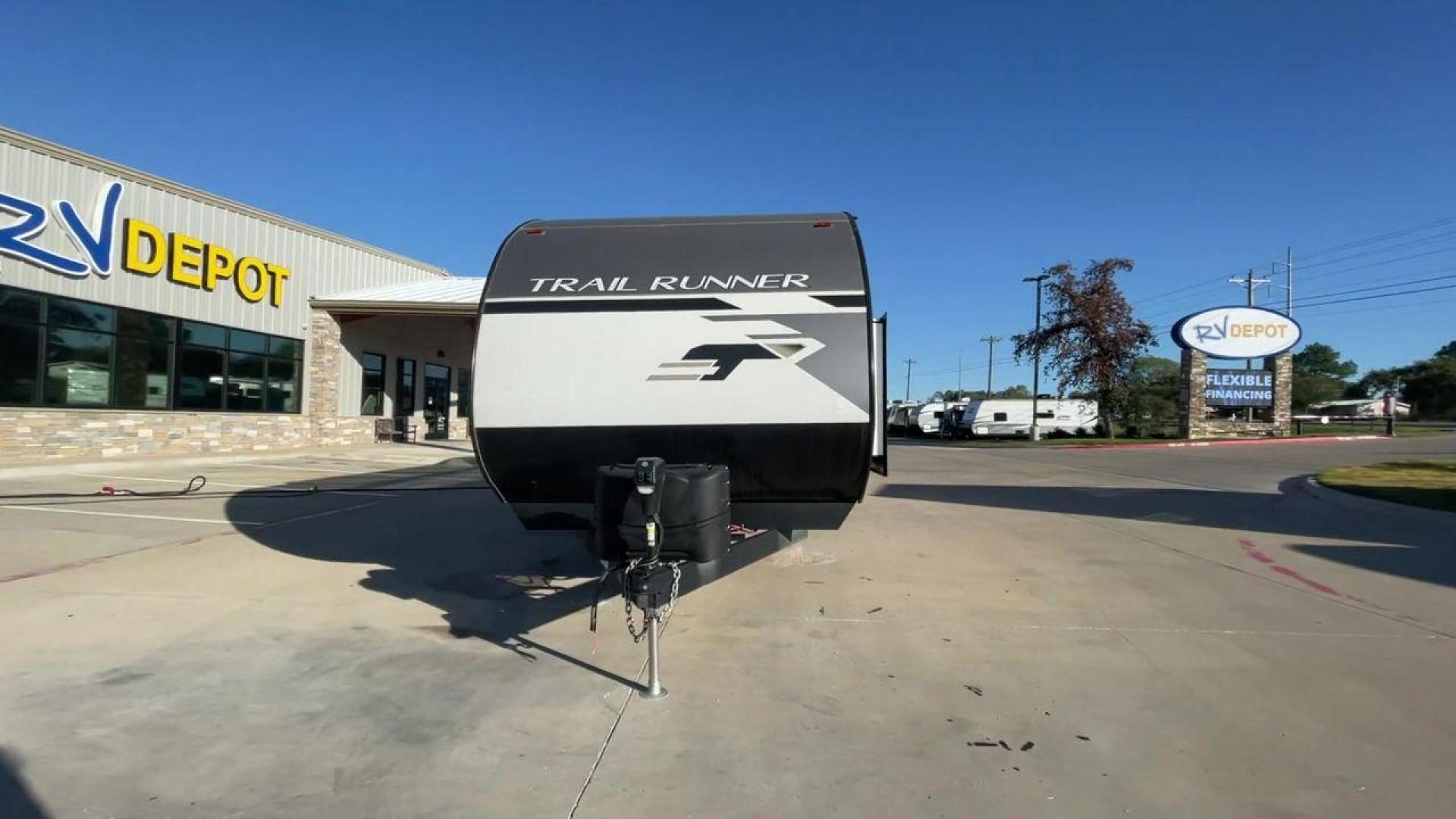 2023 HEARTLAND TRAIL RUNNER 31DB (5SFEB372XPE) , Length: 36.92 ft | Dry Weight: 7,040 lbs | GVWR: 9,642 lbs | Slides: 1 transmission, located at 4319 N Main St, Cleburne, TX, 76033, (817) 678-5133, 32.385960, -97.391212 - The 2023 Heartland Trail Runner 31DB is a versatile and spacious travel trailer designed for families and adventure enthusiasts. This vehicle is the perfect option for families or groups looking to embark on memorable road trips. The travel trailer is a bunkhouse, and features a family-centric layou - Photo#4