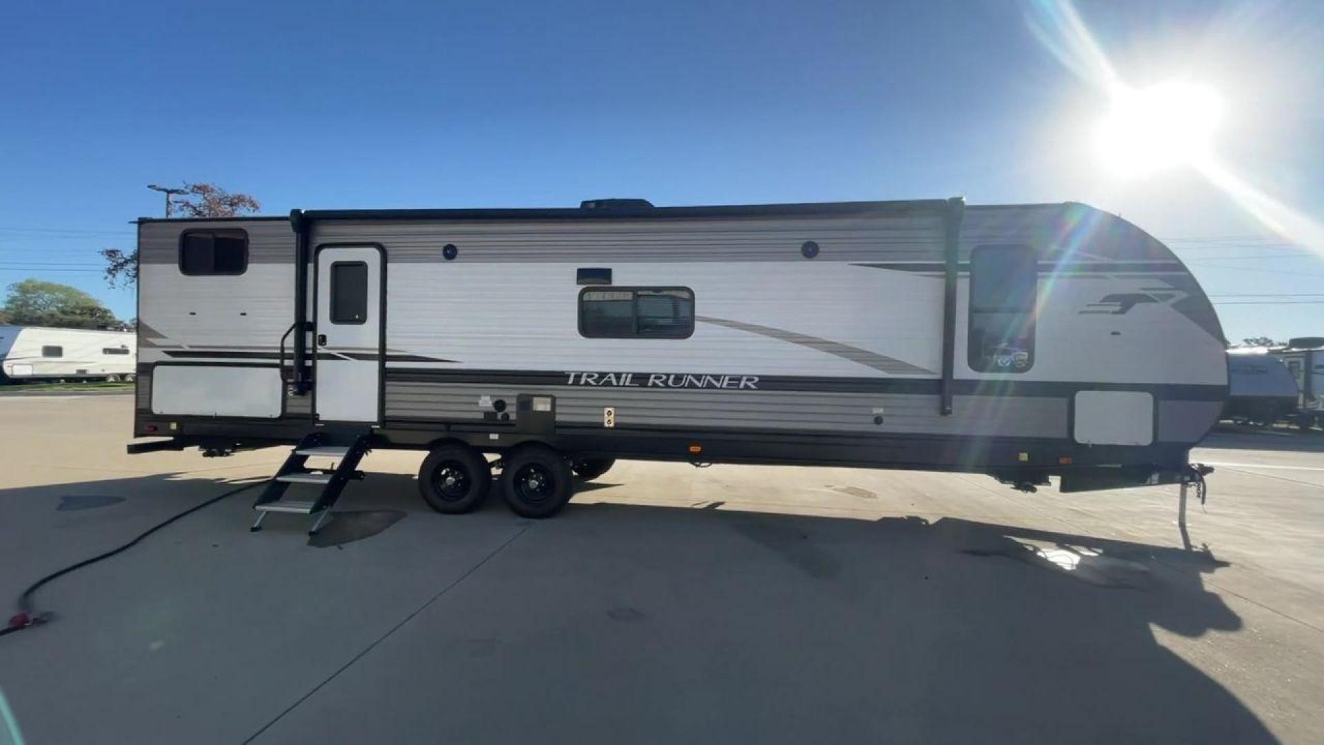 2023 HEARTLAND TRAIL RUNNER 31DB (5SFEB372XPE) , Length: 36.92 ft | Dry Weight: 7,040 lbs | GVWR: 9,642 lbs | Slides: 1 transmission, located at 4319 N Main St, Cleburne, TX, 76033, (817) 678-5133, 32.385960, -97.391212 - The 2023 Heartland Trail Runner 31DB is a versatile and spacious travel trailer designed for families and adventure enthusiasts. This vehicle is the perfect option for families or groups looking to embark on memorable road trips. The travel trailer is a bunkhouse, and features a family-centric layou - Photo#6