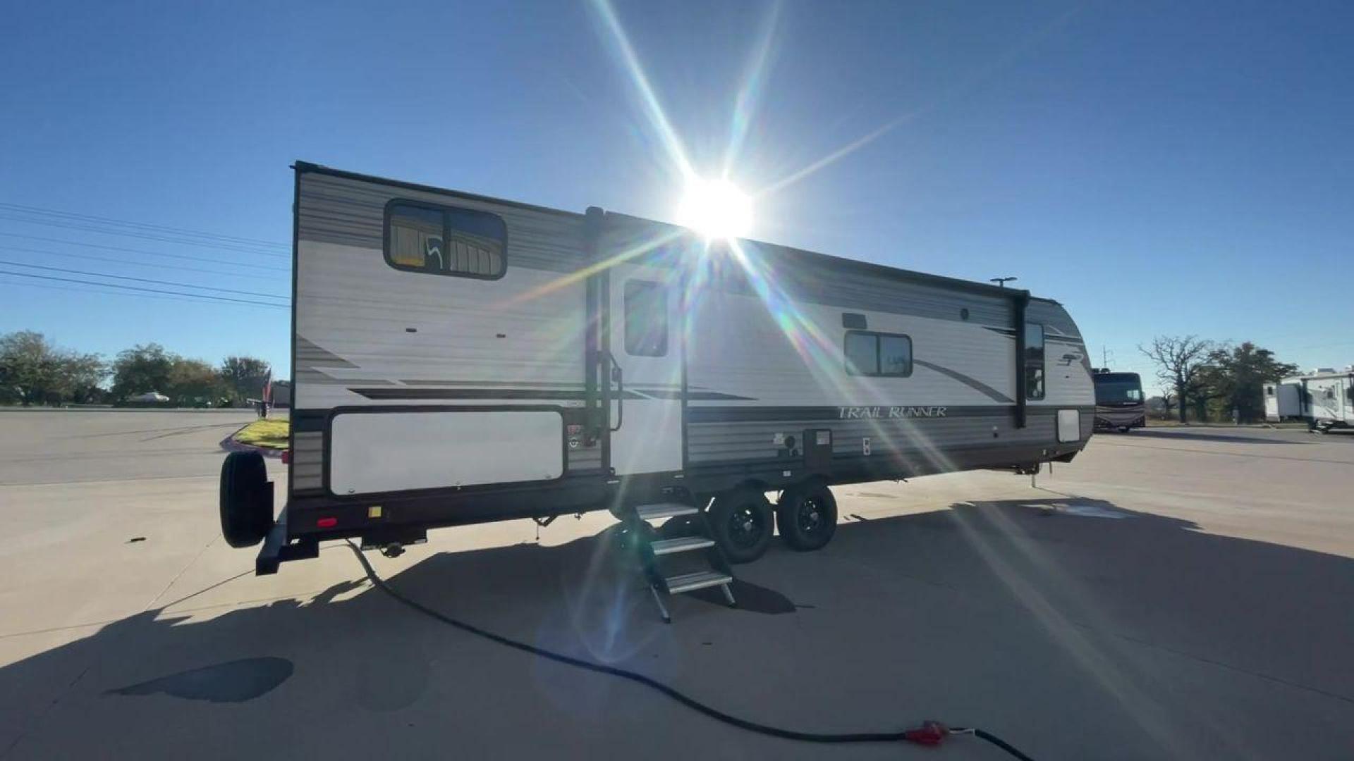 2023 HEARTLAND TRAIL RUNNER 31DB (5SFEB372XPE) , Length: 36.92 ft | Dry Weight: 7,040 lbs | GVWR: 9,642 lbs | Slides: 1 transmission, located at 4319 N Main St, Cleburne, TX, 76033, (817) 678-5133, 32.385960, -97.391212 - The 2023 Heartland Trail Runner 31DB is a versatile and spacious travel trailer designed for families and adventure enthusiasts. This vehicle is the perfect option for families or groups looking to embark on memorable road trips. The travel trailer is a bunkhouse, and features a family-centric layou - Photo#7