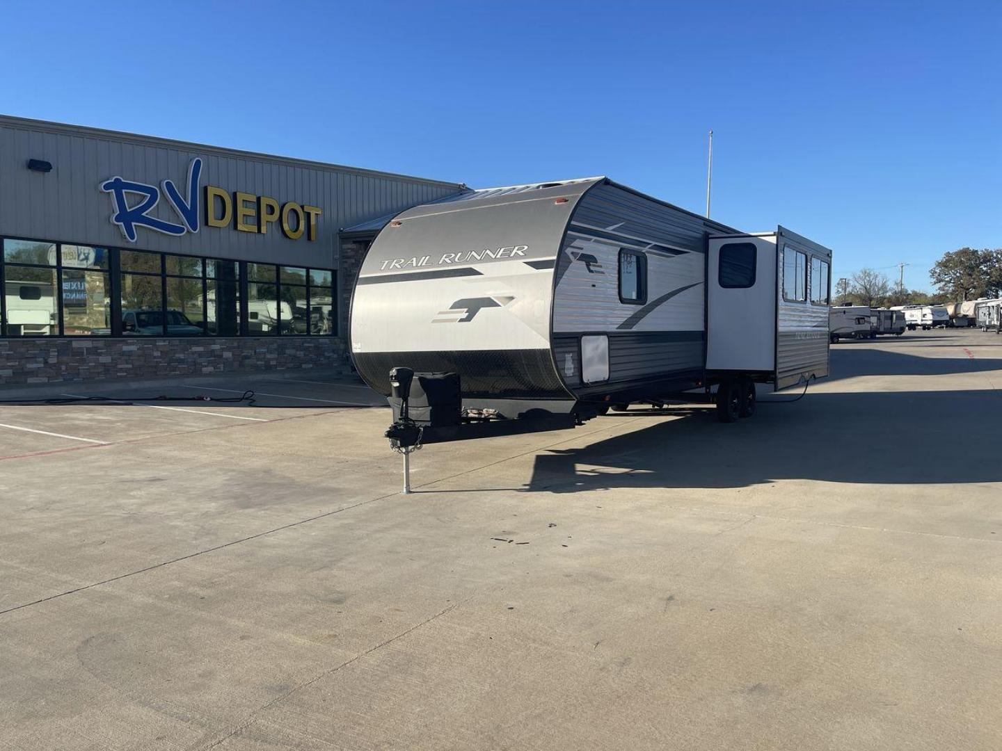 2023 HEARTLAND TRAIL RUNNER 31DB (5SFEB3723PE) , Length: 36.92 ft | Dry Weight: 7,040 lbs | GVWR: 9,642 lbs | Slides: 1 transmission, located at 4319 N Main St, Cleburne, TX, 76033, (817) 678-5133, 32.385960, -97.391212 - The 2023 Heartland Trail Runner 31DB is a versatile and spacious travel trailer designed for families and adventure enthusiasts. This vehicle is the perfect option for families or groups looking to embark on memorable road trips. The travel trailer is a bunkhouse, and features a family-centric layou - Photo#0