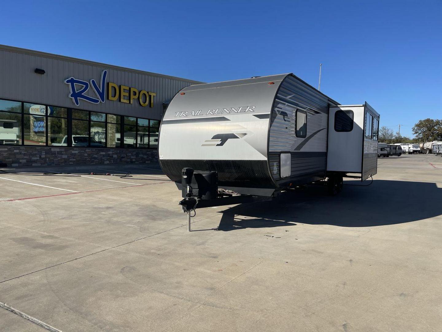 2023 HEARTLAND TRAIL RUNNER 31DB (5SFEB3720PE) , Length: 36.92 ft. | Dry Weight: 7,040 lbs. | Gross Weight: 9,642 lbs. | Slides: 1 transmission, located at 4319 N Main St, Cleburne, TX, 76033, (817) 678-5133, 32.385960, -97.391212 - The 2023 Heartland Trail Runner 31DB is a versatile and spacious travel trailer designed for families and adventure enthusiasts. This vehicle is the perfect option for families or groups looking to embark on memorable road trips. The travel trailer is a bunkhouse, and features a family-centric layou - Photo#0