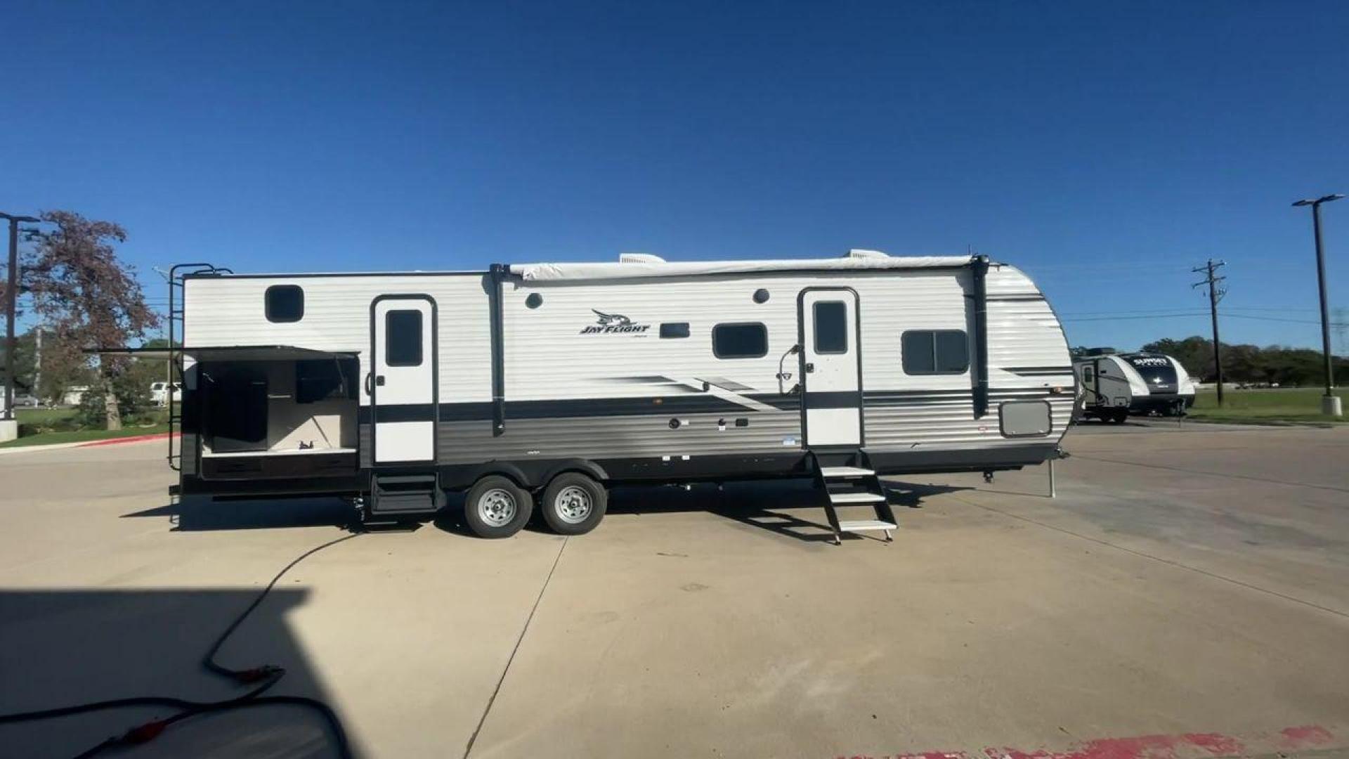 2023 JAYCO JAYFLIGHT 324BDS (1UJBC0BT8P1) , Length: 36.33 ft.| Dry Weight: 7,665 lbs. | Gross Weight: 9,000 lbs.| Slides: 2 transmission, located at 4319 N Main St, Cleburne, TX, 76033, (817) 678-5133, 32.385960, -97.391212 - Photo#2