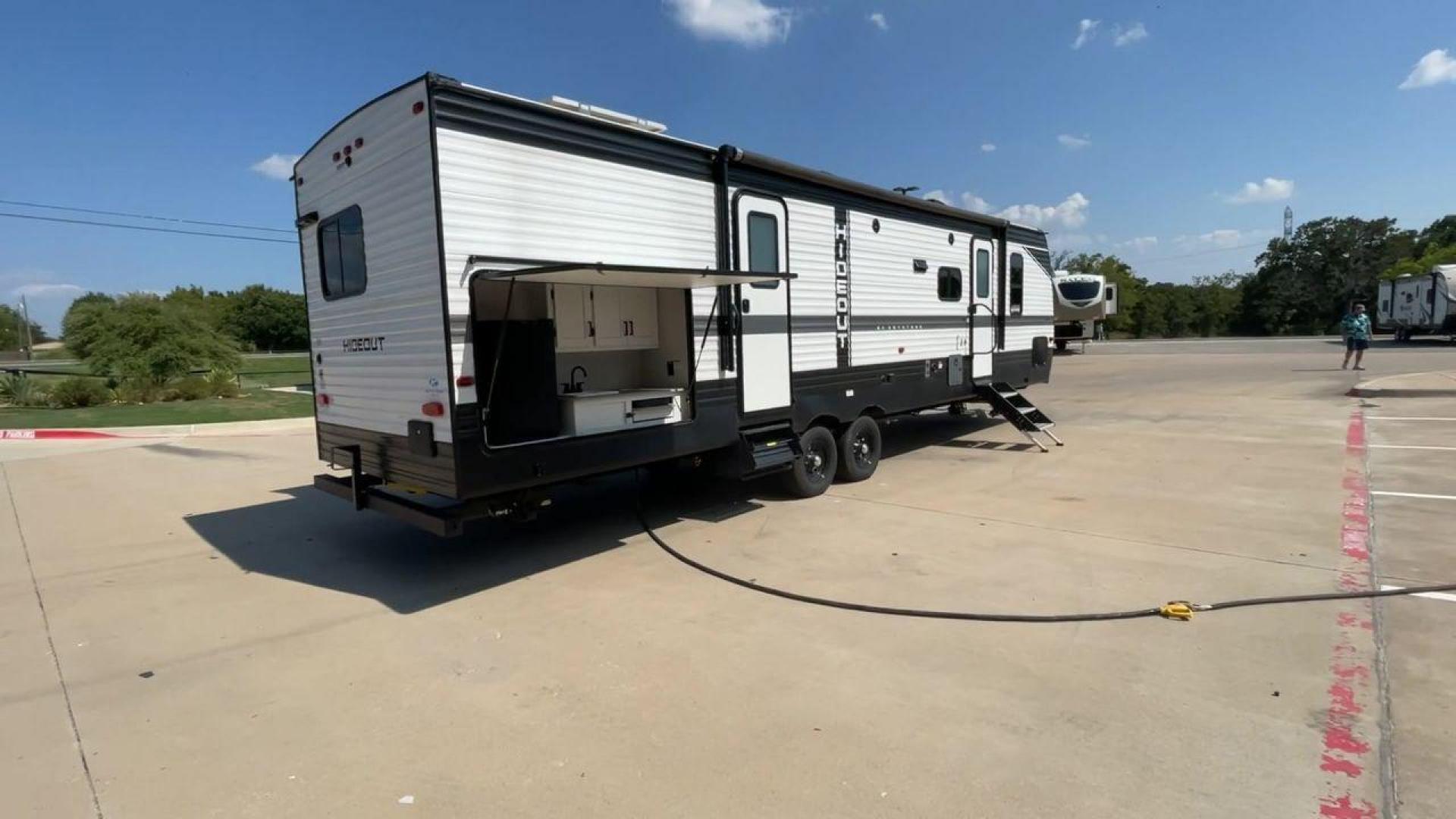 2023 KEYSTONE HIDEOUT 31BRD (4YDTH1R25P7) , Length: 35.92 ft. | Dry Weight: 7,860 lbs. | Slides: 2 transmission, located at 4319 N Main St, Cleburne, TX, 76033, (817) 678-5133, 32.385960, -97.391212 - Photo#1