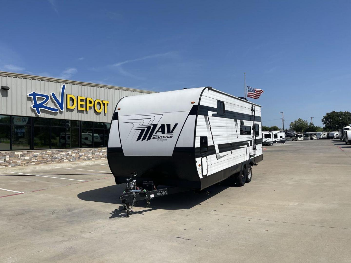 2024 GRAND DESIGN MOMENTUM 22MAV (573TM2724R1) , Length: 26.5 ft. | Dry Weight: 5,600 lbs. | Gross Weight: 10,950 lbs. transmission, located at 4319 N Main St, Cleburne, TX, 76033, (817) 678-5133, 32.385960, -97.391212 - The 2024 Grand Design Momentum 22MAV combines comfort and convenience. This compact travel trailer is only 26.5 feet long but packs a punch! With a dry weight of 5,600 pounds and a gross weight of 10,950 pounds, it is a sturdy yet towable companion for your road trips. The interior of this unit has - Photo#0