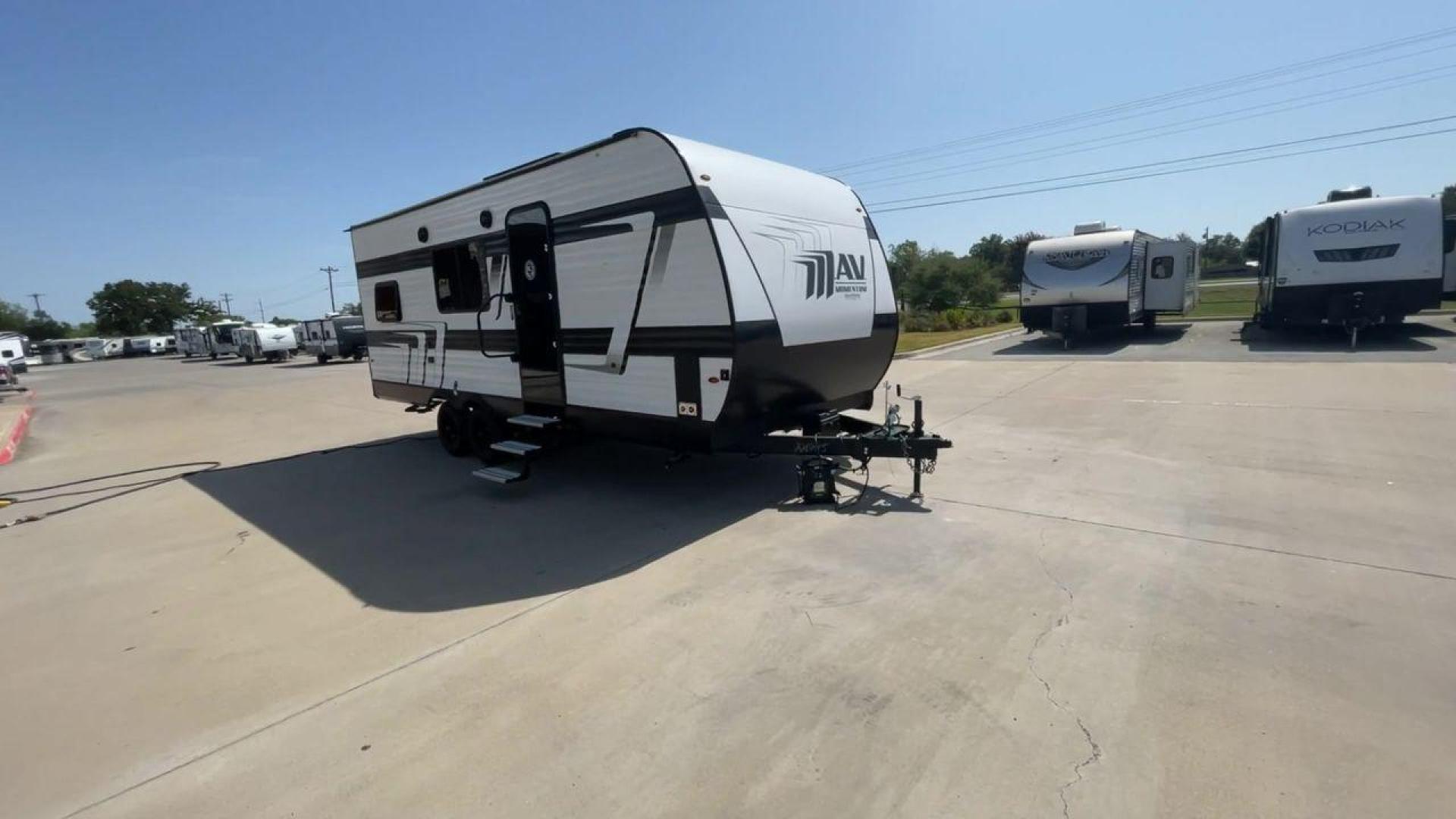 2024 GRAND DESIGN MOMENTUM 22MAV (573TM2724R1) , Length: 26.5 ft. | Dry Weight: 5,600 lbs. | Gross Weight: 10,950 lbs. transmission, located at 4319 N Main St, Cleburne, TX, 76033, (817) 678-5133, 32.385960, -97.391212 - The 2024 Grand Design Momentum 22MAV combines comfort and convenience. This compact travel trailer is only 26.5 feet long but packs a punch! With a dry weight of 5,600 pounds and a gross weight of 10,950 pounds, it is a sturdy yet towable companion for your road trips. The interior of this unit has - Photo#3